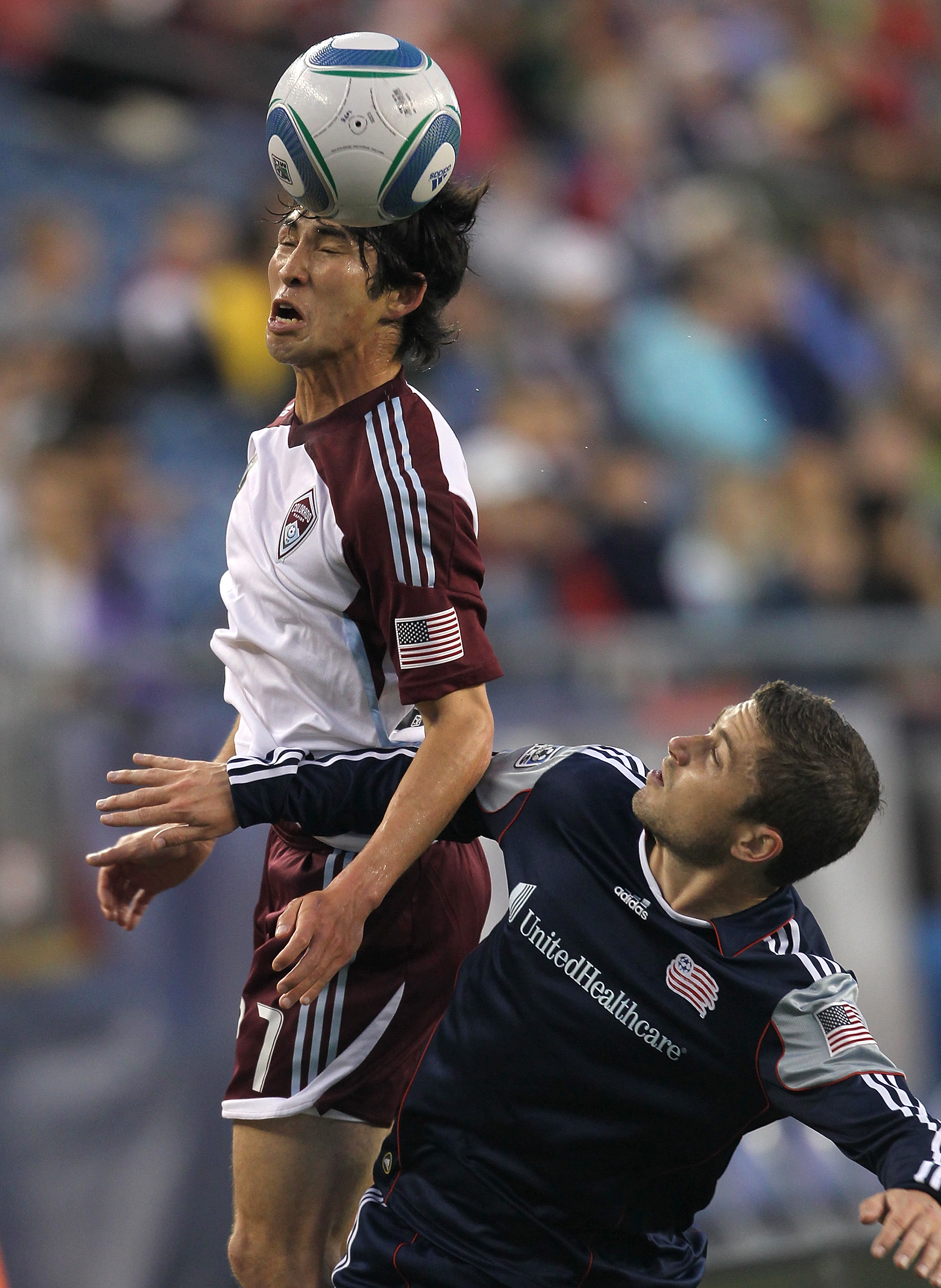 FOXBORO, MA - MAY 7: Kosuke Kimura #27 of Colorado Rapids battles Chris Tierney #8 of New England Revolution at Gillette Stadium on May 7, 2011 in Foxboro, Massachusetts. (Photo by Jim Rogash/Getty Images)