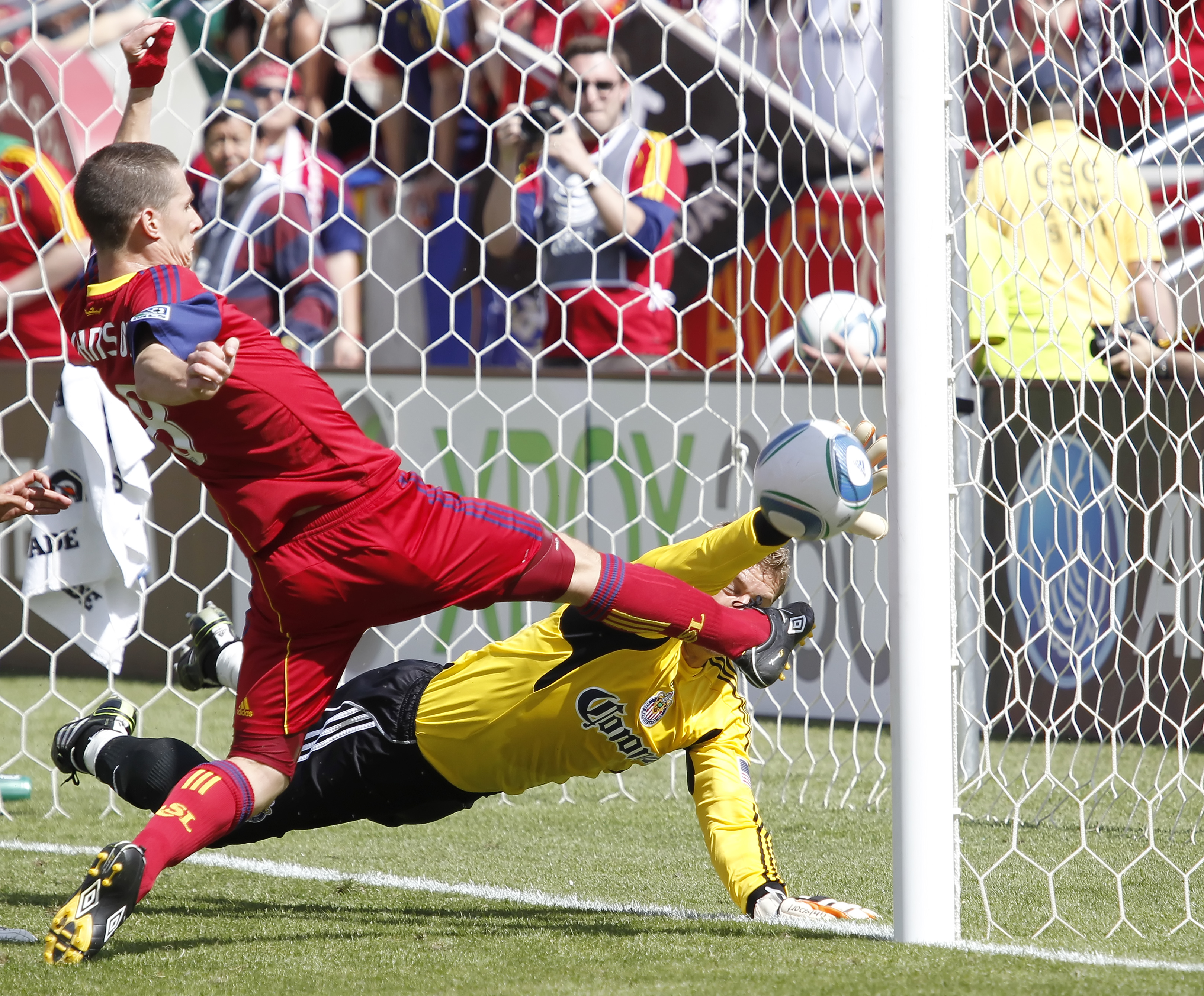 SANDY, UT - MAY 7: Will Johnson #8 of Real Salt Lake scores the game winning goal on goalie Dan Kennedy #1 of Chivas USA during the second half of an MLS soccer game May 7, 2011 at Rio Tinto Stadium in Sandy, Utah. Real Salt Lake beat Chivas USA 1-0. (Ph