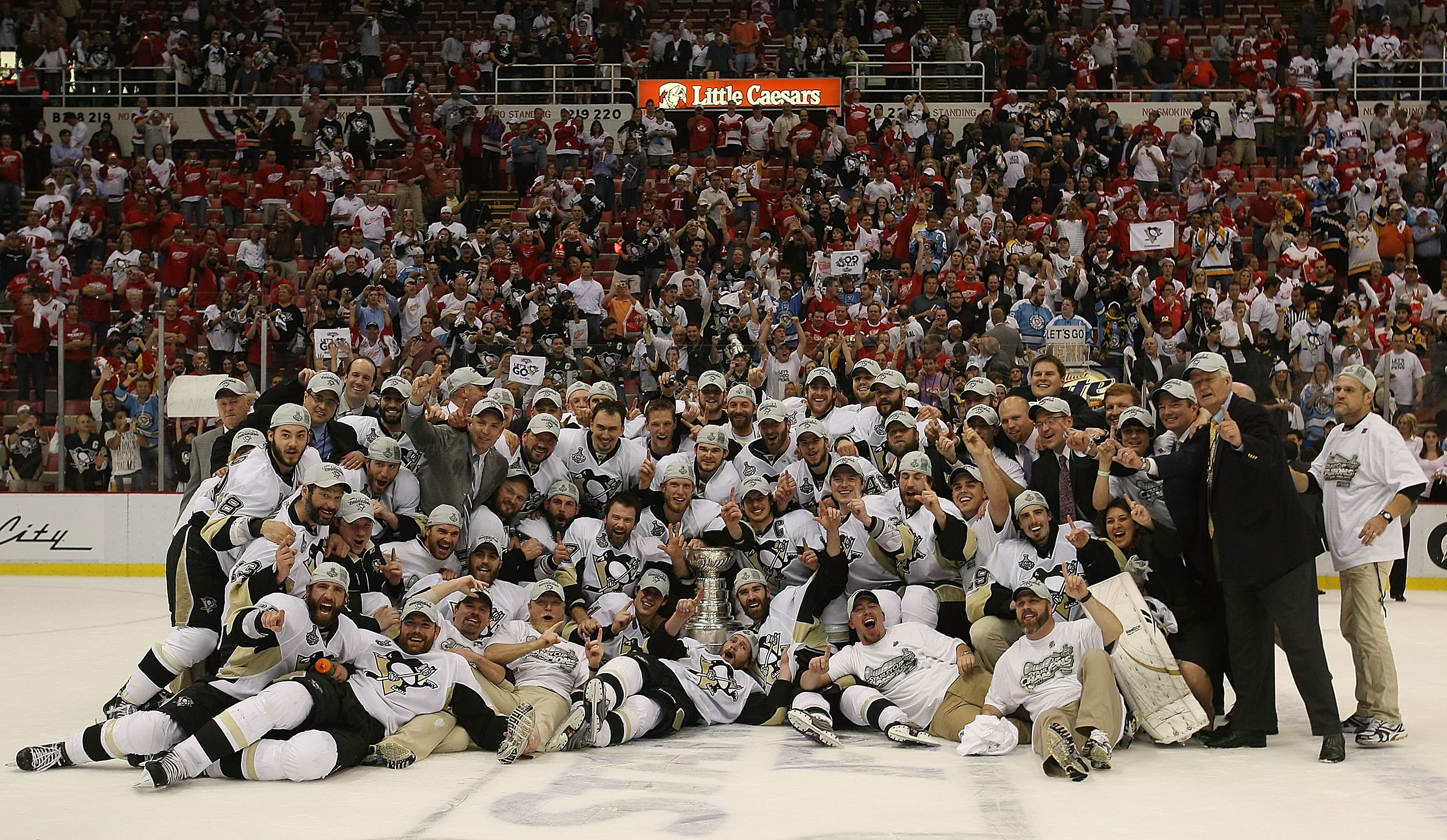 DETROIT - JUNE 12:  The Pittsburgh Penguins pose with the Stanley Cup following the Penguins victory over the Detroit Red Wings in Game Seven of the 2009 NHL Stanley Cup Finals at Joe Louis Arena on June 12, 2009 in Detroit, Michigan.  (Photo by Bruce Ben