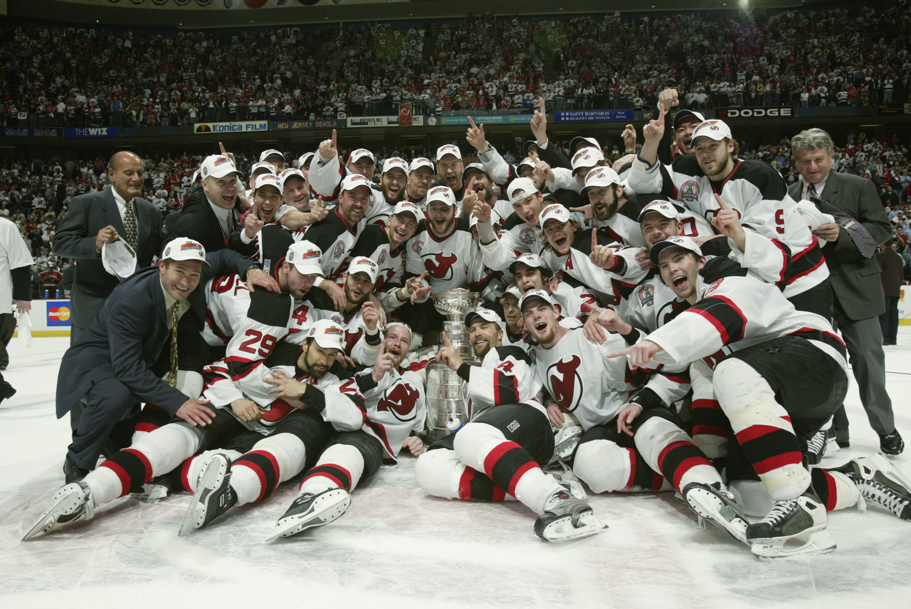 EAST RUTHERFORD, NJ - JUNE 9:  The New Jersey Devils celebrate winning the Stanley Cup after defeating the Mighty Ducks of Anaheim 3-0 in game seven of the 2003 Stanley Cup Finals at Continental Airlines Arena on June 9, 2003 in East Rutherford, New Jerse