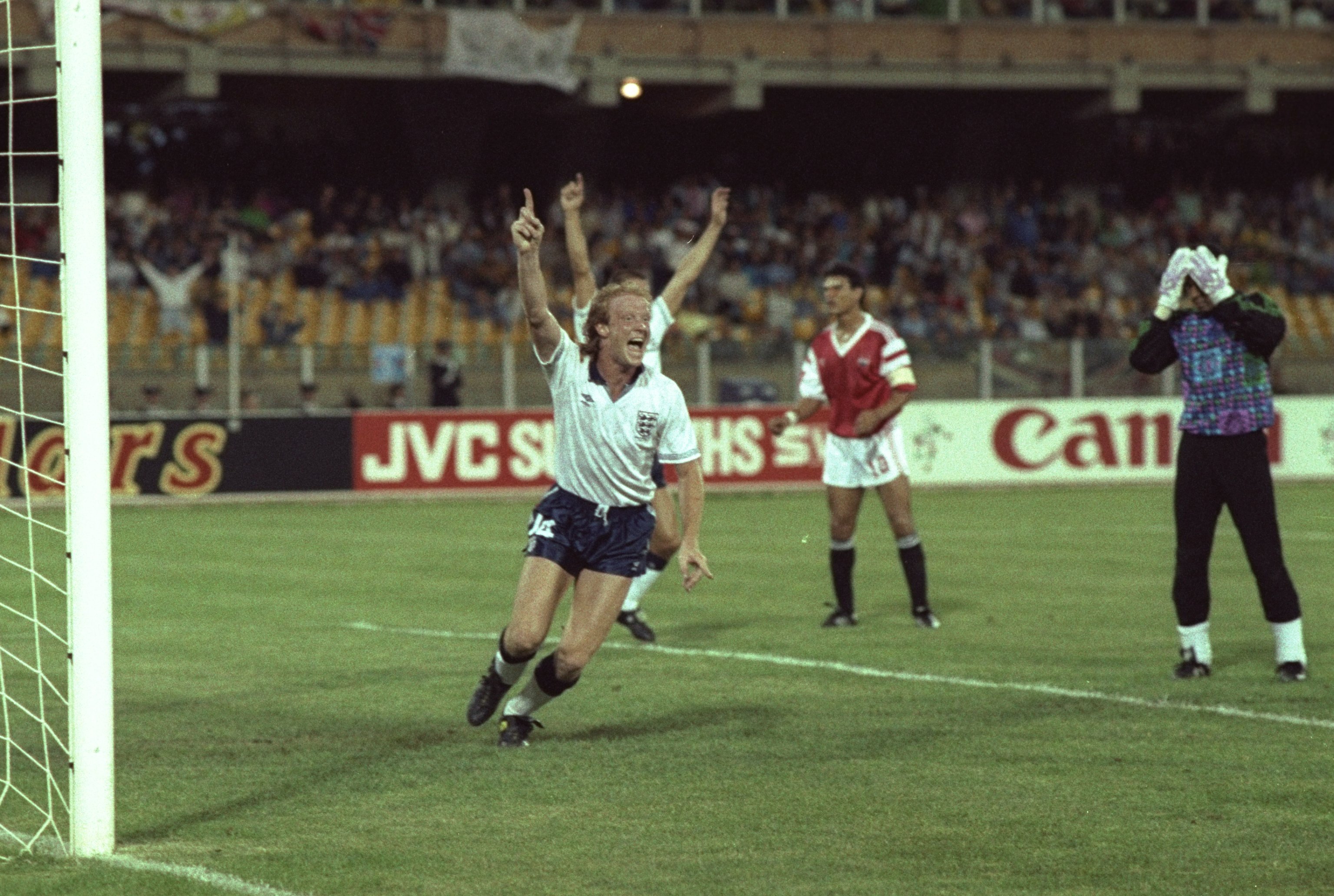21 Jun 1990:  Mark Wright (centre) of England scores the only goal during the World Cup match against Egypt in Cagliori, Italy. England won the match 1-0.   \ Mandatory Credit: David  Cannon/Allsport