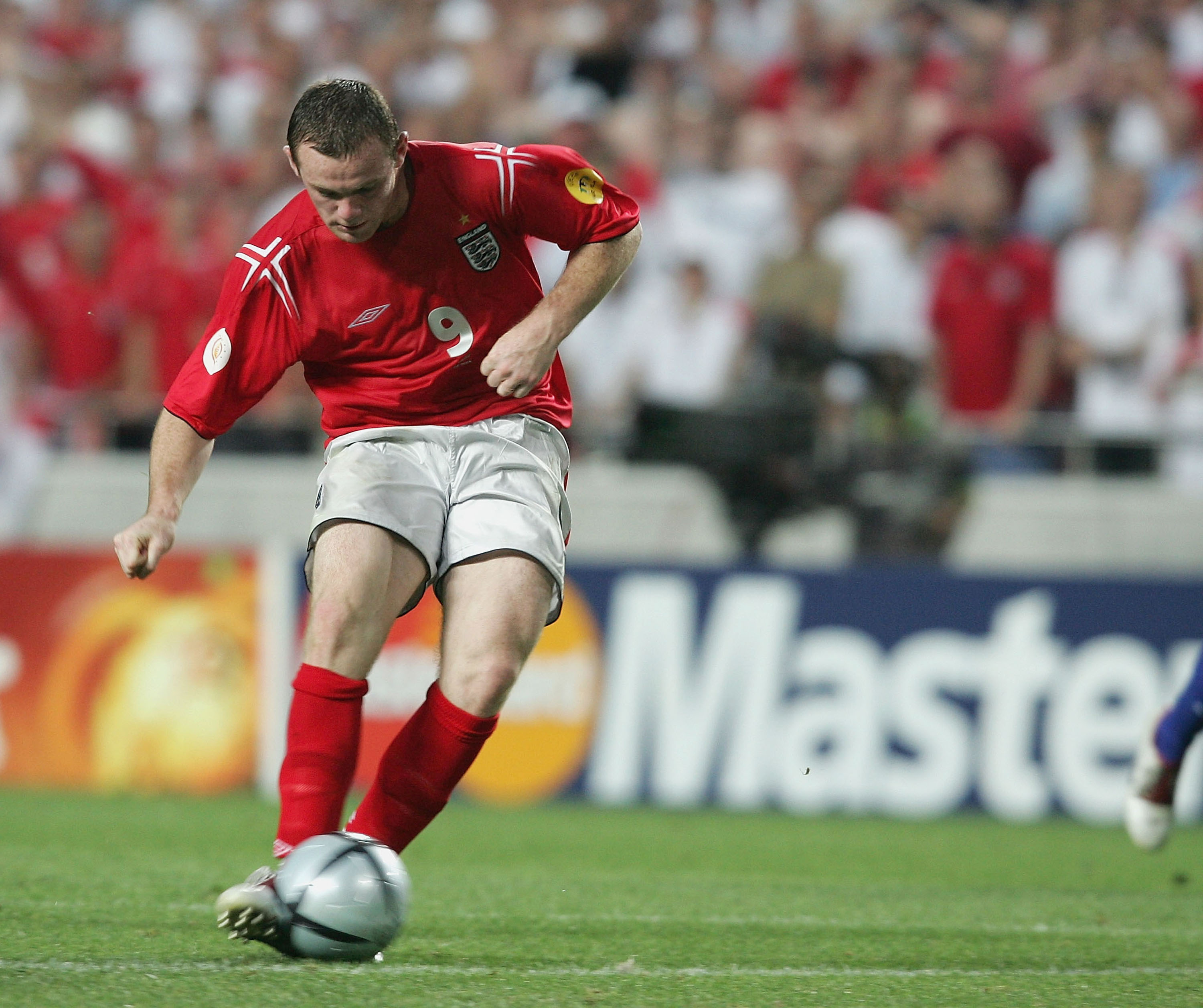 LISBON, PORTUGAL - JUNE 21: Wayne Rooney of England scores the third goal during the UEFA Euro 2004, Group B match between Croatia and England at the Luz Stadium on June 21, 2004 in Lisbon, Portugal. (Photo by Ross Kinnaird/Getty Images)
