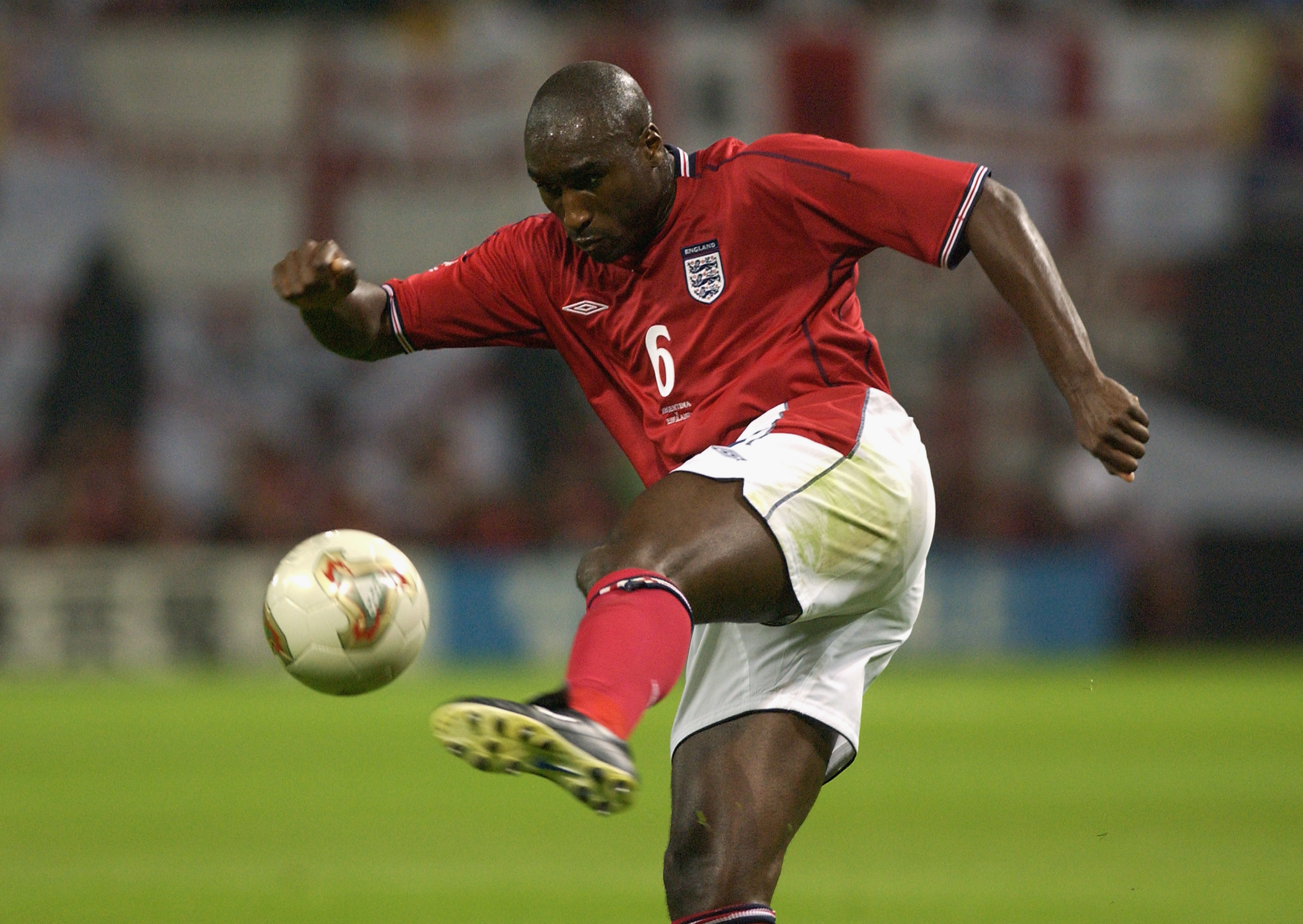 SAPPORO - JUNE 7:  Sol Campbell of England clears the ball from danger during the FIFA World Cup Finals 2002 Group F match between England and Argentina played at the Sapporo Dome, in Sapporo, Japan on June 7, 2002. England won the match 1-0. DIGITAL IMAG