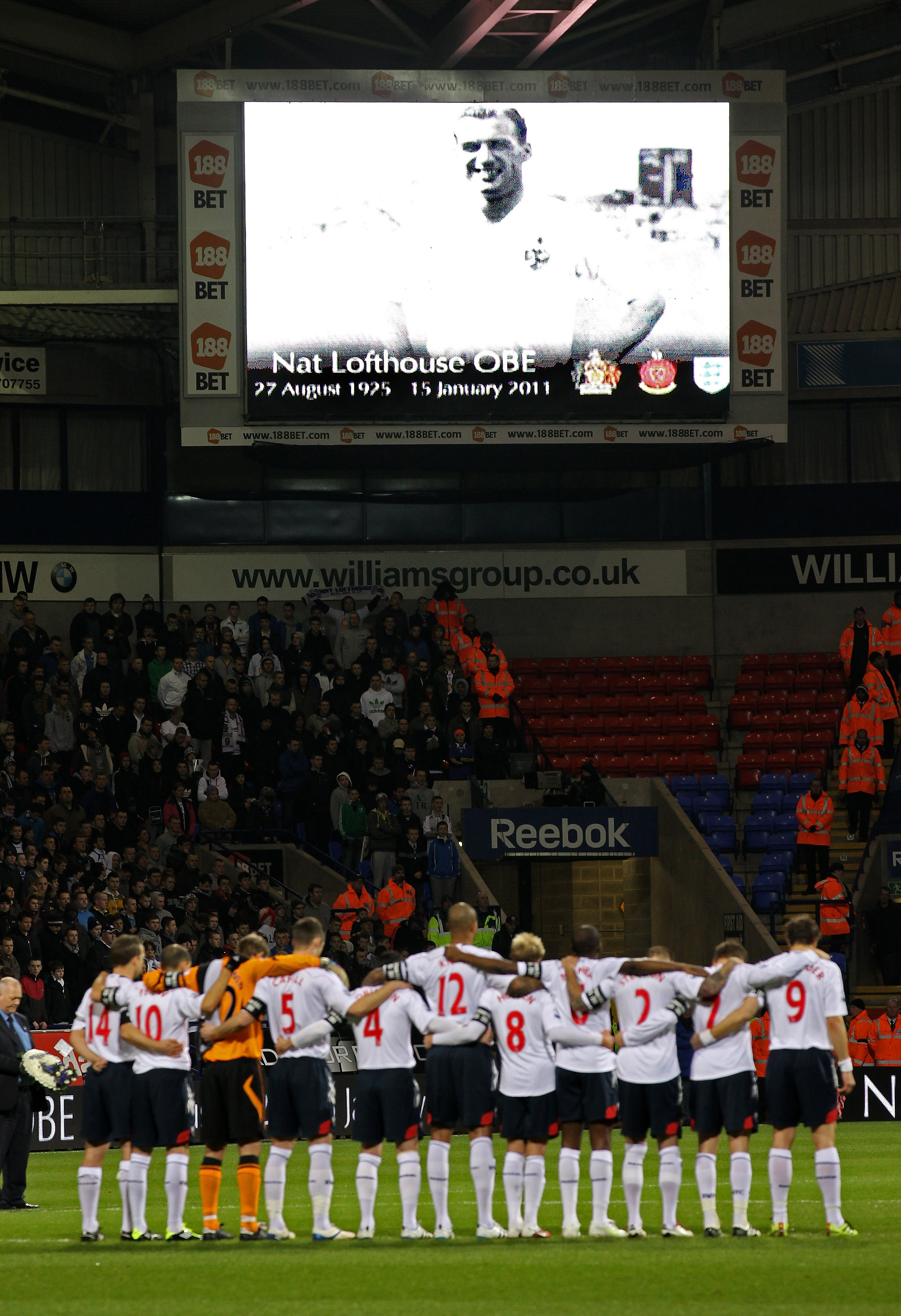 BOLTON, ENGLAND - JANUARY 24:  The Bolton Wanderers players observes a minutes silence for the late Nat Lofthouse prior to the Barclays Premier League match between Bolton Wanderers and Chelsea at the Reebok Stadium on January 24, 2011 in Bolton, England.