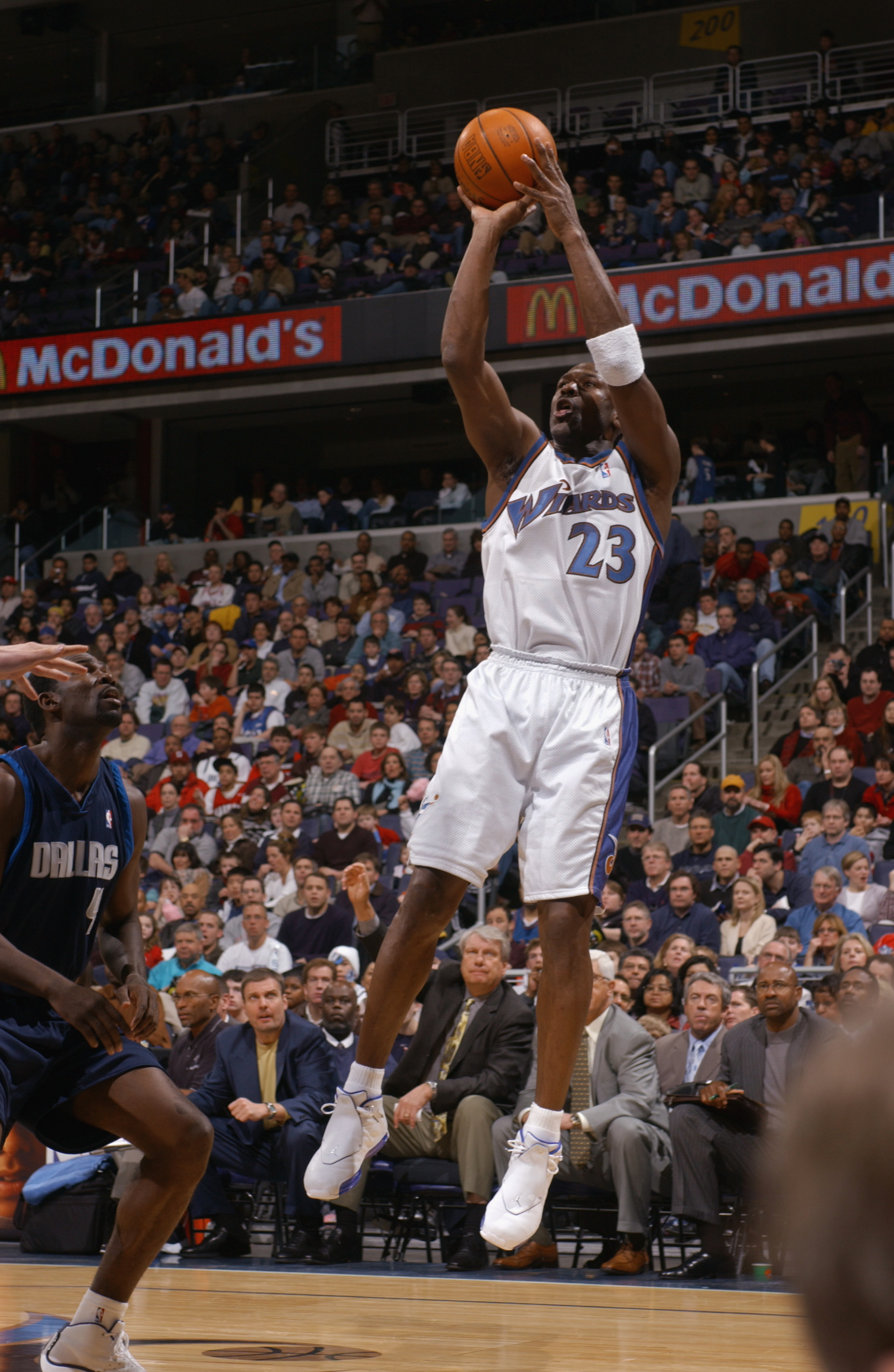 WASHINGTON - FEBRUARY 23:  Michael Jordan #23 of the Washington Wizards shoots against the Dallas Mavericks during the NBA game at MCI Center on February 23, 2003 in Washington, D.C.  The Mavericks won in overtime 106-101.  NOTE TO USER: User expressly ac