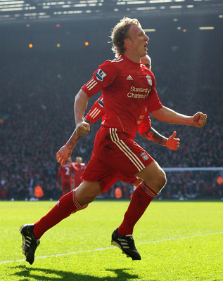 LIVERPOOL, ENGLAND - MARCH 06:  Dirk Kuyt of Liverpool celebrates scoring his team's second goal  during the Barclays Premier League match between Liverpool and Manchester United at Anfield on March 6, 2011 in Liverpool, England.  (Photo by Alex Livesey/G