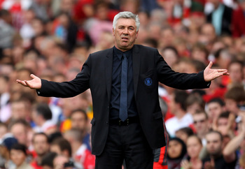 MANCHESTER, ENGLAND - MAY 08:  Chelsea Manager Carlo Ancelotti reacts during the Barclays Premier League match between Manchester United and Chelsea at Old Trafford on May 8, 2011 in Manchester, England.  (Photo by Alex Livesey/Getty Images)