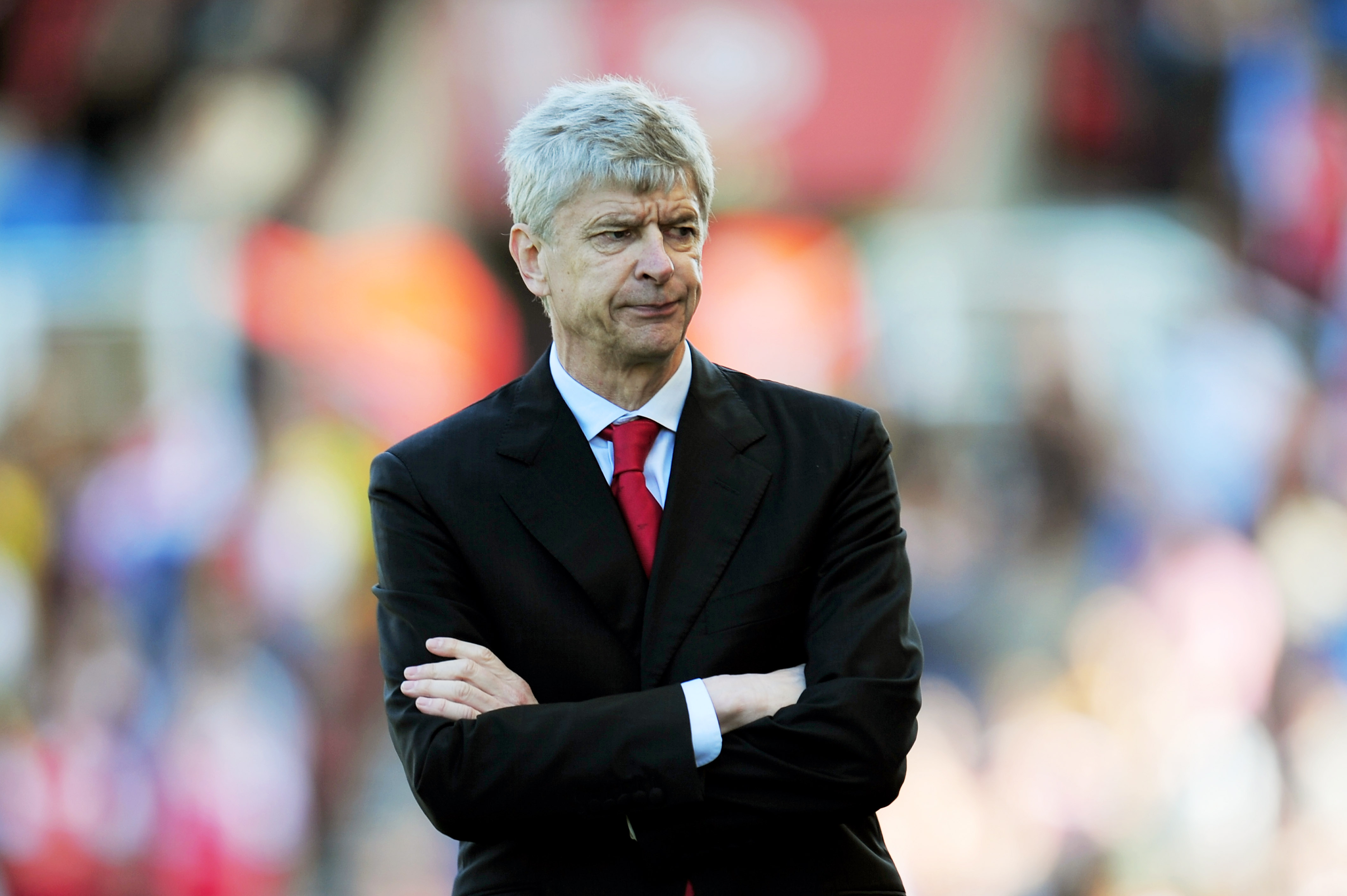 STOKE ON TRENT, ENGLAND - MAY 08:  A dejected Arsene Wenger the Arsenal manager looks on as his team head towards a 3-1 defeat during the Barclays Premier League match between Stoke City and Arsenal at the Britannia Stadium on May 8, 2011 in Stoke on Tren