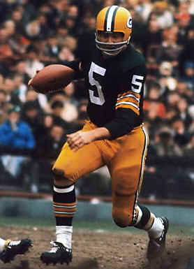 Running back Paul Hornung of the Green Bay Packers carries the ball