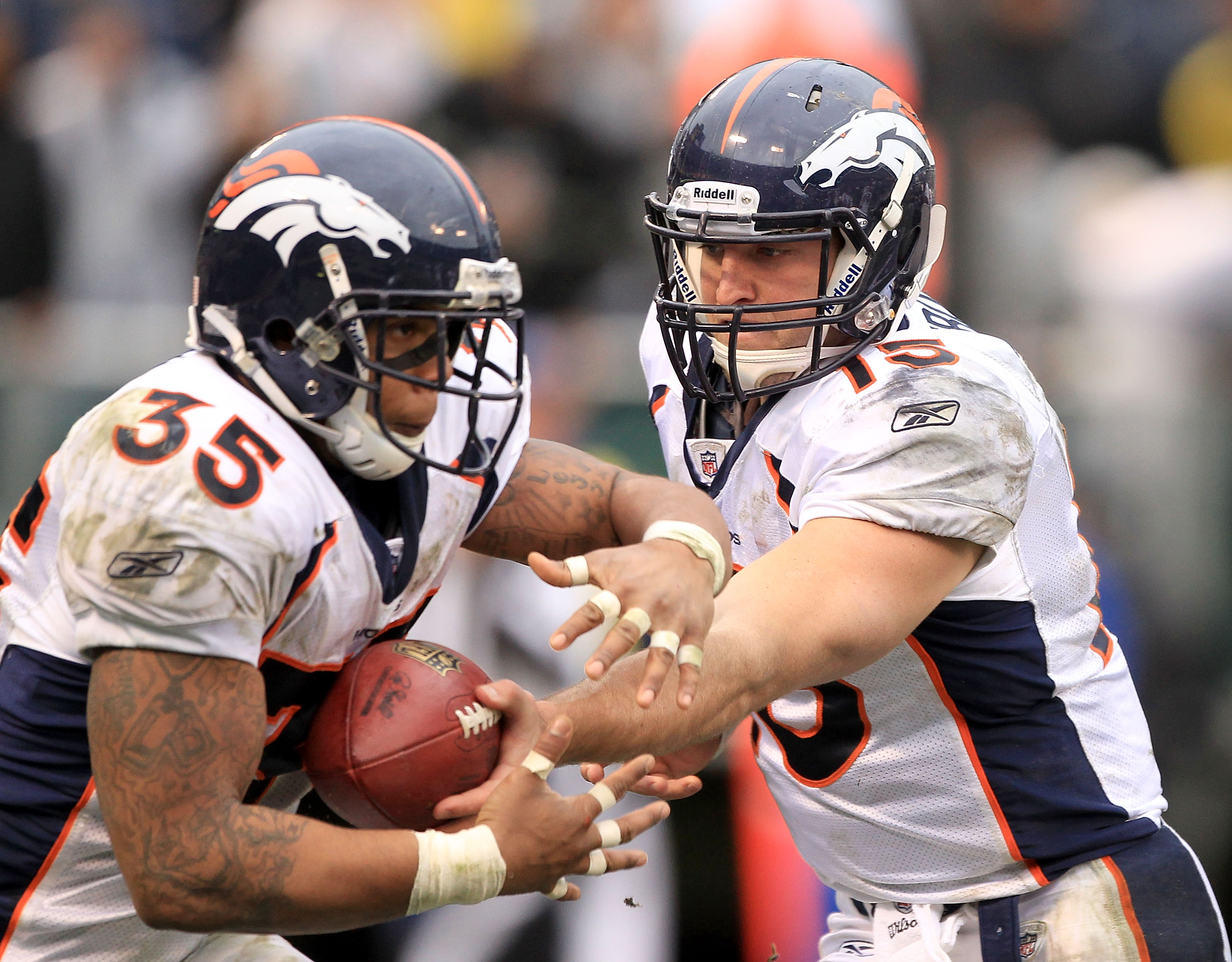 Denver Broncos running back Lance Ball runs a drill during