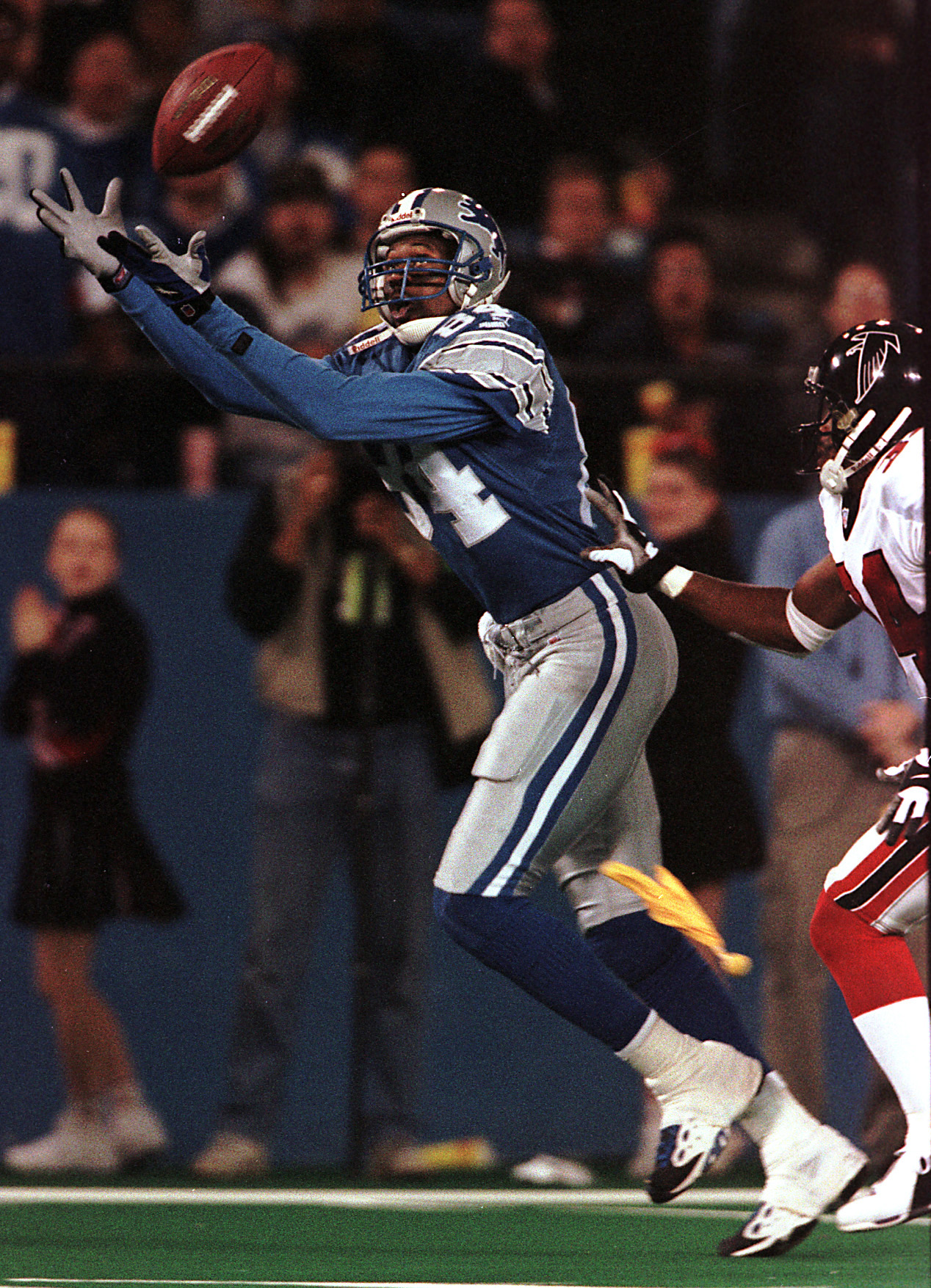 Detroit Lions wide receiver Herman Moore celebrates his first touchdown of  the season with fans during the third quarter against the Green Bay Packers  in Pontiac, Mich., Sunday, Oct. 8, 2000. Moore