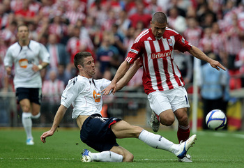 LONDON, ENGLAND - APRIL 17:  Gary Cahill of Bolton battles with Jonathan Walters of Stoke during the FA Cup sponsored by E.ON semi final match between Bolton Wanderers and Stoke City at Wembley Stadium on April 17, 2011 in London, England.  (Photo by Ross
