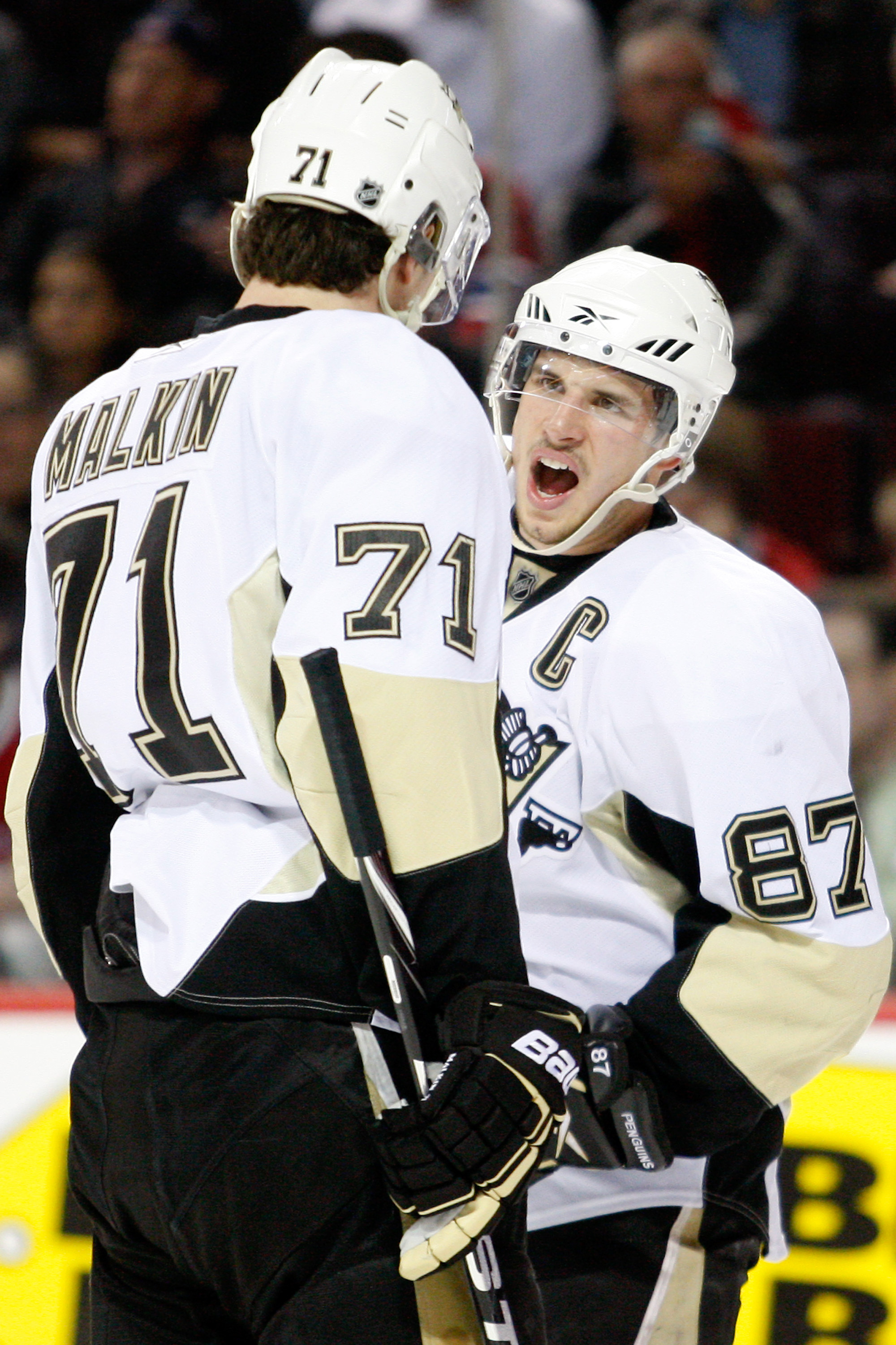 MONTREAL- MAY 4:  Sidney Crosby #87 and Evgeni Malkin #71 of the Pittsburgh Penguins discuss a play in Game Three of the Eastern Conference Semifinals against the Montreal Canadiens during the 2010 NHL Stanley Cup Playoffs at the Bell Centre on May 4, 201