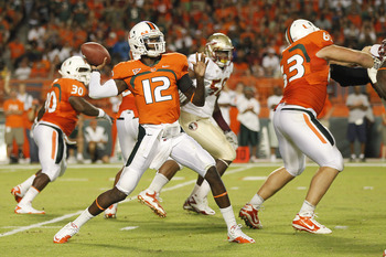 MIAMI, FL - OCTOBER 9: Jacory Harris #12 of the Miami Hurricanes hrows the ball against the Florida State Seminoles on October 9, 2010 at Sun Life Stadium in Miami, Florida. (Photo by Joel Auerbach/Getty Images)