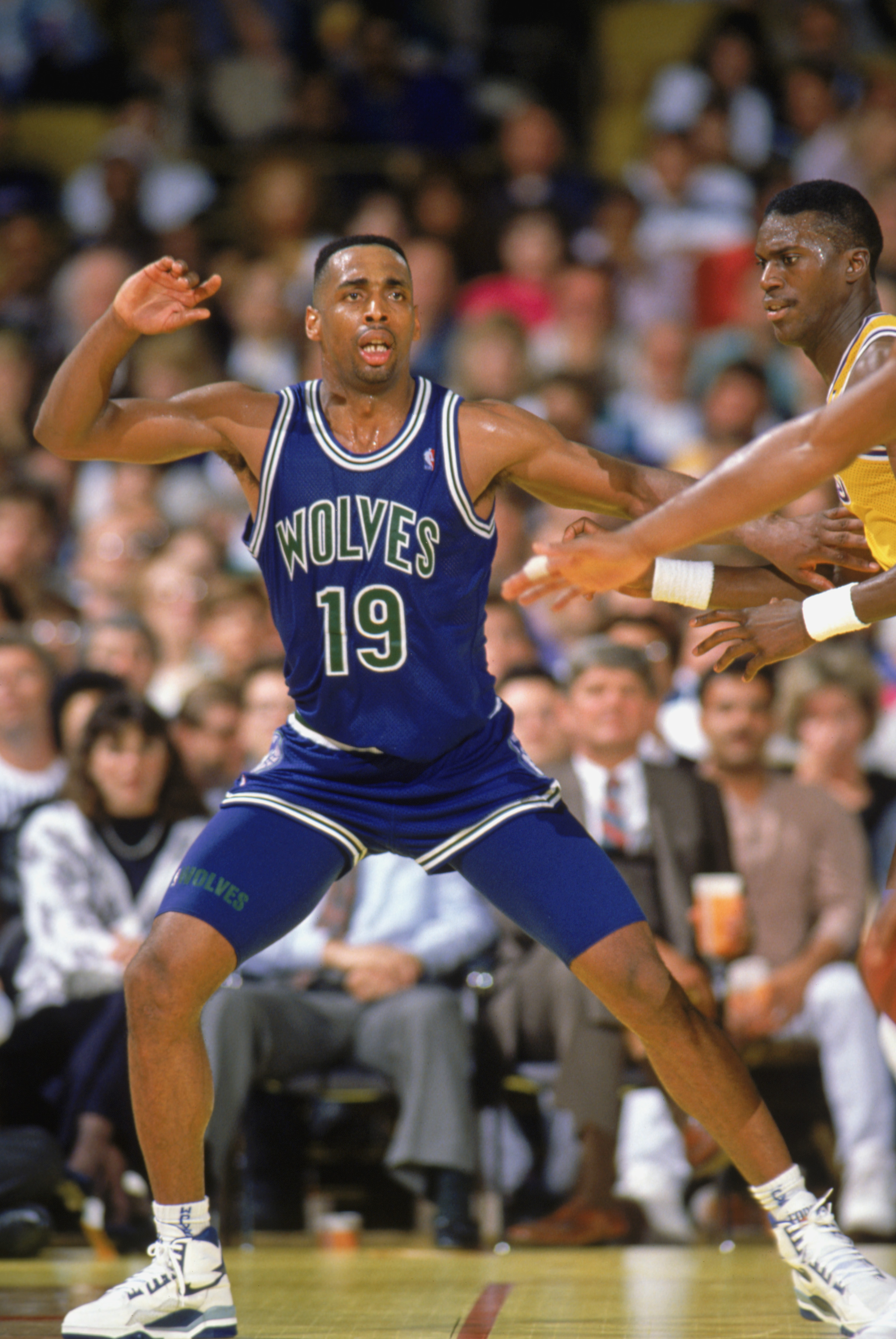 LOS ANGELES - 1990:  Tony Campbell #19 of the Minnesota Timberwolves calls for the ball during a game against the Los Angeles Lakers at the Great Western Forum in Los Angeles, California during the 1989-1990 NBA season.  (Photo by Mike Powell/Getty Images