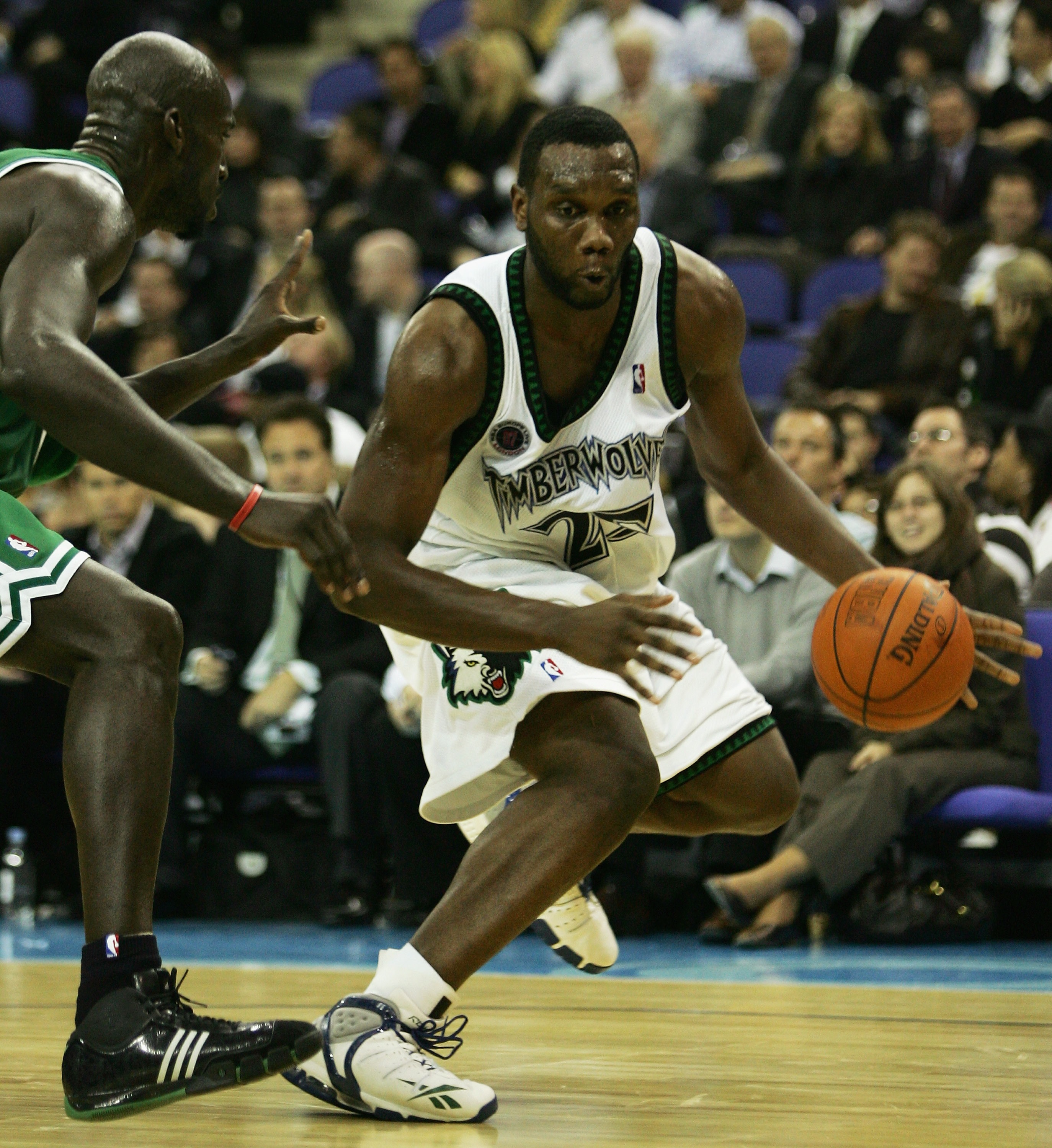 LONDON - OCTOBER 10:  Al Jefferson #25 of Minnesota is challenged by Kevin Garnett (L) of Boston during NBA Europe Live 2007 Tour match between the Boston Celtics and the Minnesota Timberwolves at the O2 Arena on October 10, 2007 in London, England.  NOTE