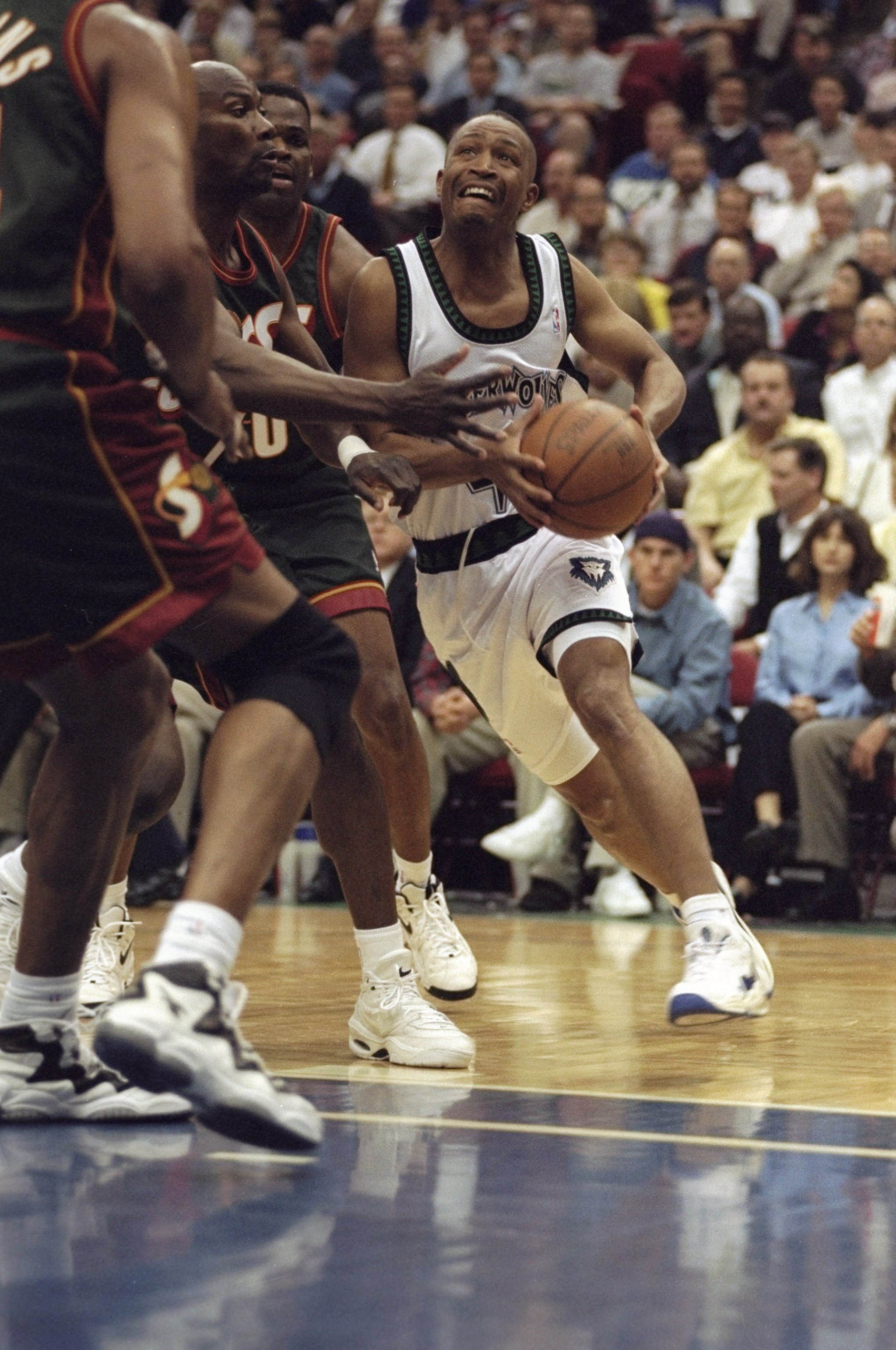 28 Apr 1998: Michael Williams of the Minneapolis Timberwolves in action against Dale Ellis of the Seattle Super Sonics during a game at the Target Center in Minneapolis, Minnesota. The Timberwolves defeated the Sonics 98-90.