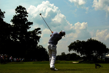 PONTE VEDRA BEACH, FL - MAY 13:  Davis Love III hits his tee shot on the ninth hole during the second round of THE PLAYERS Championship held at THE PLAYERS Stadium course at TPC Sawgrass on May 13, 2011 in Ponte Vedra Beach, Florida.  (Photo by Mike Ehrma