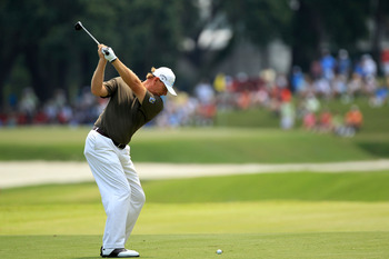 PONTE VEDRA BEACH, FL - MAY 13:  Ernie Els of South Africa hits an approach shot on the 11th hole during the second round of THE PLAYERS Championship held at THE PLAYERS Stadium course at TPC Sawgrass on May 13, 2011 in Ponte Vedra Beach, Florida.  (Photo