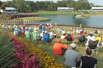 PONTE VEDRA BEACH, FL - MAY 13:  Golf fans watch the play on the 17th hole during the second round of THE PLAYERS Championship held at THE PLAYERS Stadium course at TPC Sawgrass on May 13, 2011 in Ponte Vedra Beach, Florida.  (Photo by Scott Halleran/Gett