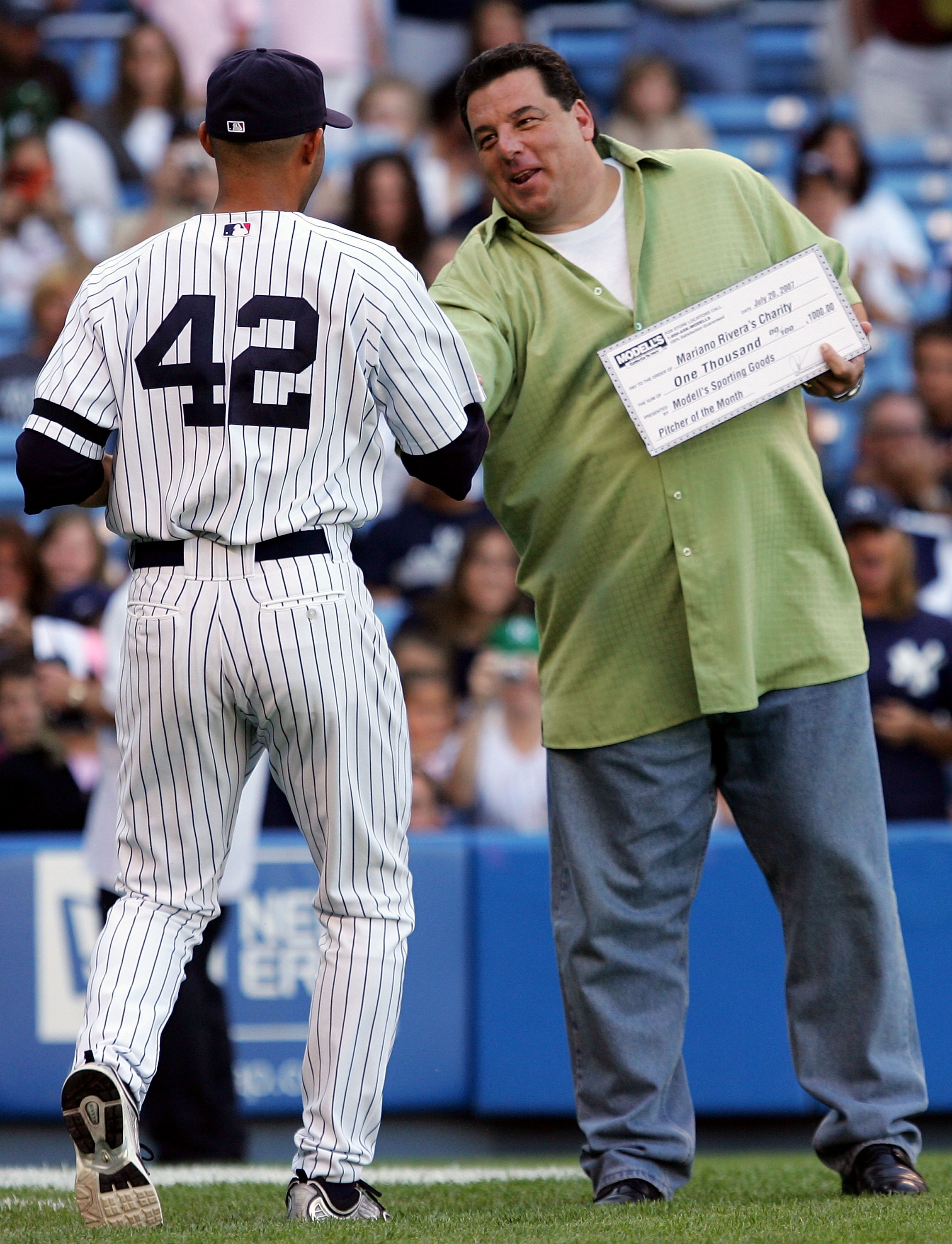 NEW YORK - JULY 20:  Actor Steve Schirripa presents Mariano Rivera #42 of the New York Yankees with the Yankees pitcher of the month award before the game agaist the Tampa Bay Devil Rays at Yankee Stadium July 20, 2007 in the Bronx borough of New York Cit
