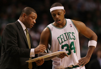 BOSTON - DECEMBER 15: Head coach Doc Rivers goes over a play with Paul Pierce #34 of the Boston Celtics  of the Utah Jazz on December 15, 2008 at TD Banknorth Garden in Boston, Massachusetts. The Celtics defeated the Jazz 100-91. NOTE TO USER: User expres