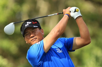 PONTE VEDRA BEACH, FL - MAY 15:  K.J. Choi of South Korea hits his tee shot on the 11th hole during the final round of THE PLAYERS Championship held at THE PLAYERS Stadium course at TPC Sawgrass on May 15, 2011 in Ponte Vedra Beach, Florida.  (Photo by St