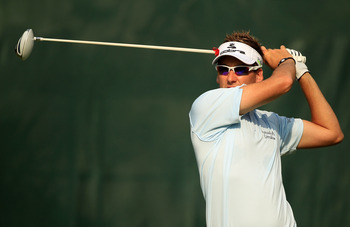 PONTE VEDRA BEACH, FL - MAY 13:  Ian Poulter of England hits a tee shot on the fifth hole during the second round of THE PLAYERS Championship held at THE PLAYERS Stadium course at TPC Sawgrass on May 13, 2011 in Ponte Vedra Beach, Florida.  (Photo by Stre