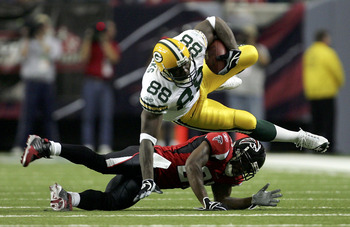 Bubba Franks of the Green Bay Packers is tackled after an eight yard