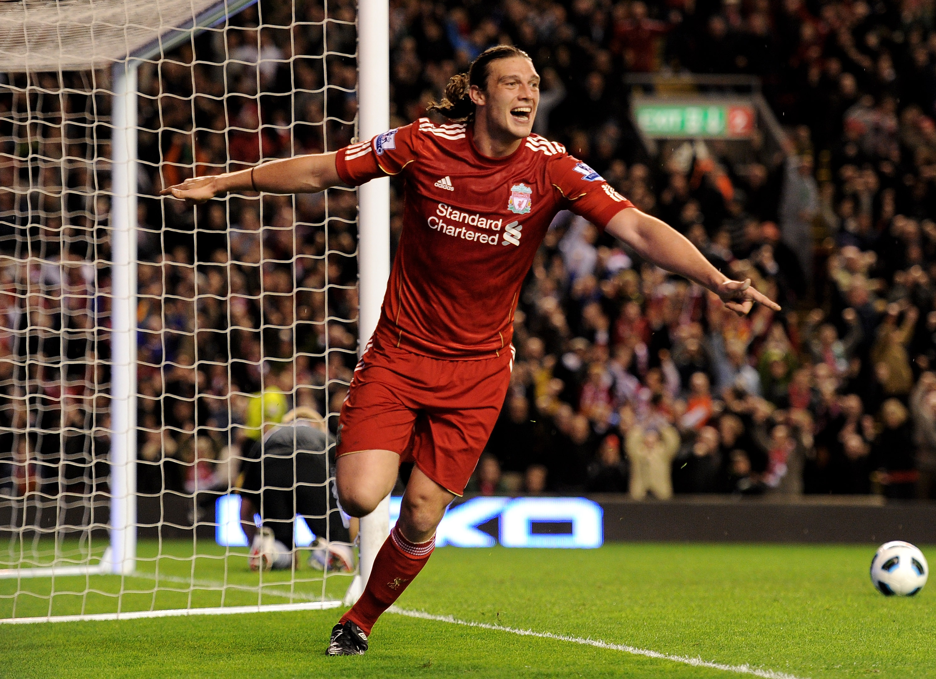 LIVERPOOL, ENGLAND - APRIL 11:  Andy Carroll of Liverpool celebrates scoring his team's third goal during the Barclays Premier League match between Liverpool and Manchester City at Anfield on April 11, 2011 in Liverpool, England.  (Photo by Michael Regan/