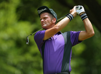 FT. WORTH, TX - MAY 23:  Jesper Parnevik hits a shot during the final round of the Bank of America Colonial at the Colonial Country Club on May 23, 2004 in Ft. Worth, Texas.  (Photo by Jonathan Ferrey/Getty Images)