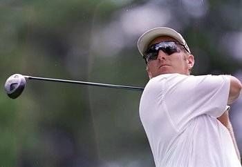 21 Aug 1999: David Duval swings during the Sprint International at the Castle Pines Golf Club in Castle Rock, Colorado.