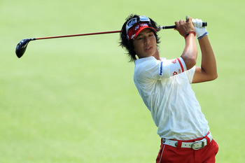 AUGUSTA, GA - APRIL 10:  Ryo Ishikawa of Japan watches his second shot on the second hole during the final round of the 2011 Masters Tournament on April 10, 2011 in Augusta, Georgia.  (Photo by David Cannon/Getty Images)