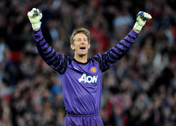 MANCHESTER, ENGLAND - MAY 04:  Edwin van der Sar of Manchester United celebrates after his team's second goal during the UEFA Champions League Semi Final second leg match between Manchester United and Schalke at Old Trafford on May 4, 2011 in Manchester, 