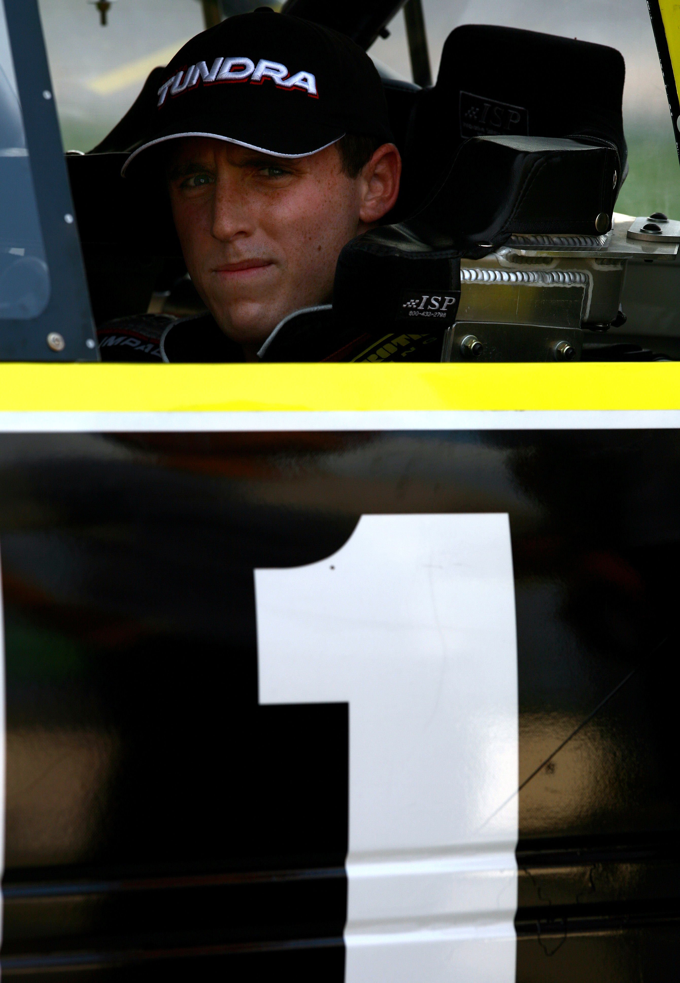 FORT WORTH- JUNE 7: Aaron Fike driver of the #1 RFMS/Red Horse Racing during qualifying for the NASCAR Craftsman Truck Series Sam's Town 400 on June 7, 2007 at Texas Motor Speedway  in Fort Worth, Texas. (Photo by Gavin Lawrence/Getty Images)