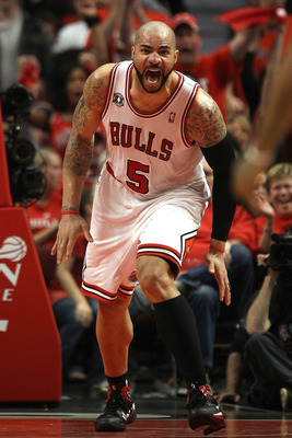 CHICAGO, IL - MAY 15: Carlos Boozer #5 of the Chicago Bulls reacts against the Miami Heat in Game One of the Eastern Conference Finals during the 2011 NBA Playoffs on May 15, 2011 at the United Center in Chicago, Illinois. NOTE TO USER: User expressly ack