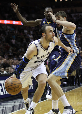 SAN ANTONIO, TX - APRIL 27:  Manu Ginobili #20 of the San Antionio Spurs drives against Marc Gasol #33 of the Memphis Grizzlies in Game Five of the Western Conference Quarterfinals in the 2011 NBA Playoffs on April 27, 2011 at AT&T Center in San Antonio,