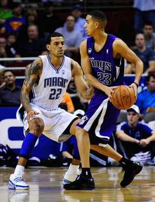 ORLANDO, FL - JANUARY 22:  Kevin Martin #23 of the Sacramento Kings is guarded by Matt Barnes #22 of the Orlando Magic during the game at Amway Arena on January 22, 2010 in Orlando, Florida. NOTE TO USER: User expressly acknowledges and agrees that, by do