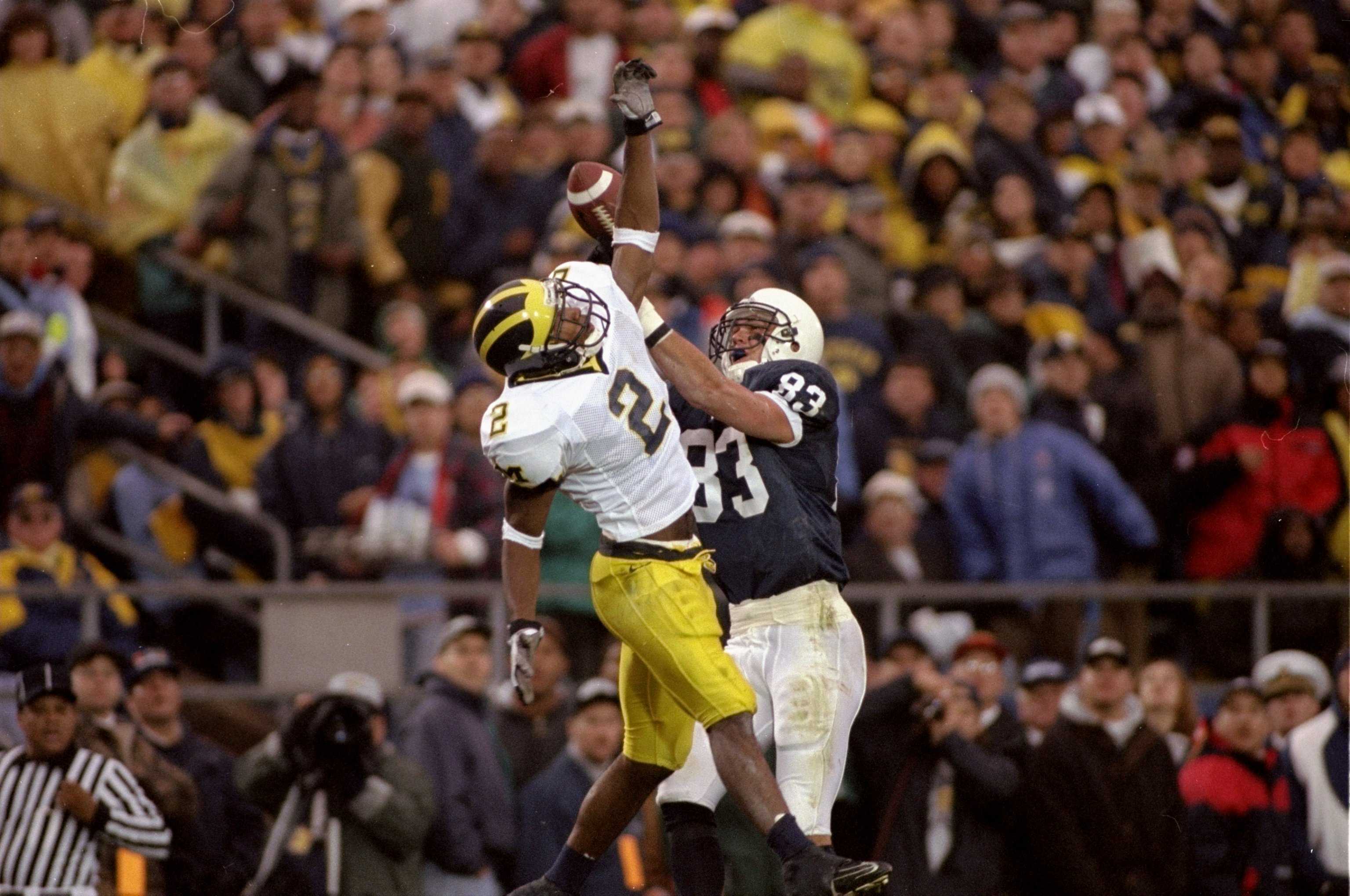 8 Nov 1997: Defensive back Charles Woodson of the Michigan Wolverines in action during a game against the Penn State Nittany Lions at Beaver Stadium in State College, Pennsylvania. Michigan won the game, 34-10. Mandatory Credit: Rick Stewart /Allsport