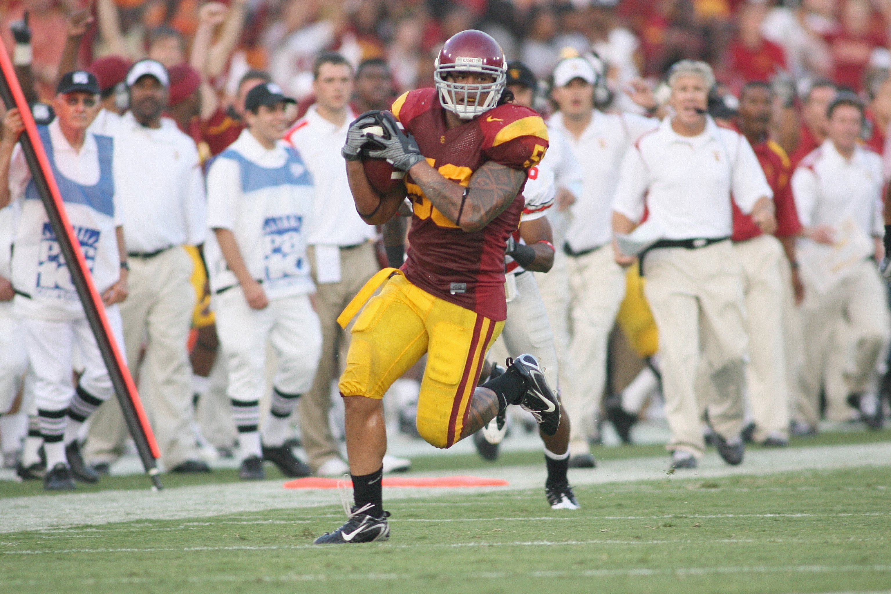 LOS ANGELES - SEPTEMBER 13: Rey Maualuga #58 of the USC Trojans returns an interception 48 yards for a touchdown against the Ohio State Buckeyes in the second quarter on September 13, 2008 at the Los Angeles Memorial Coliseum in Los Angeles, California.