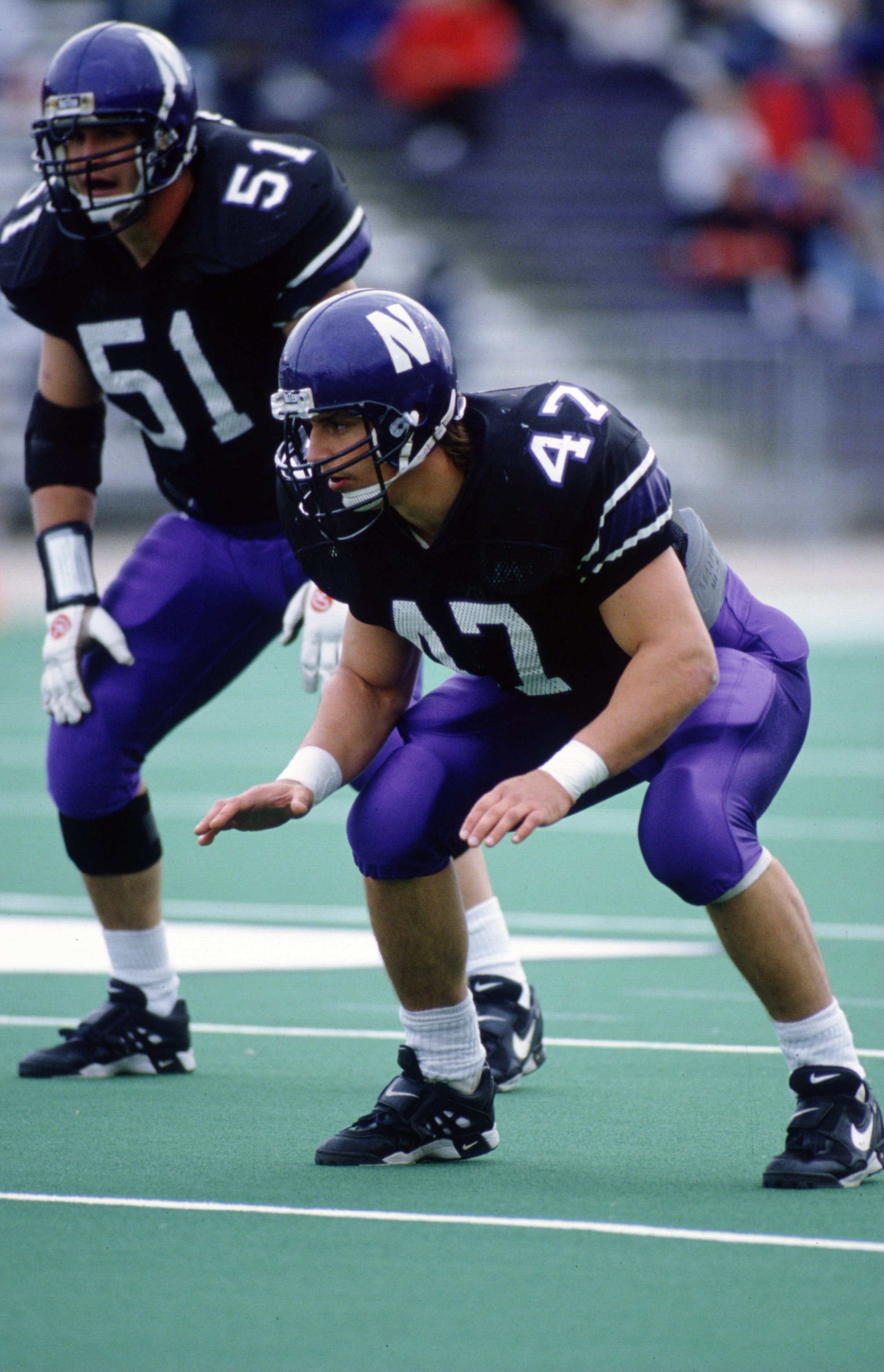 29 Oct 1994: NORTHWESTERN UNIVERSITY LINEBACKERS PAT FITZGERALD #51 AND GEOFF SHEIN #47 WATCH AND WAIT FOR THE SNAP OF THE BALL DURING THE WILDCATS 28-7 LOSS TO THE INDIANA HOOSIERS AT DYCHE STADIUM IN EVANSTON, ILLINOIS.