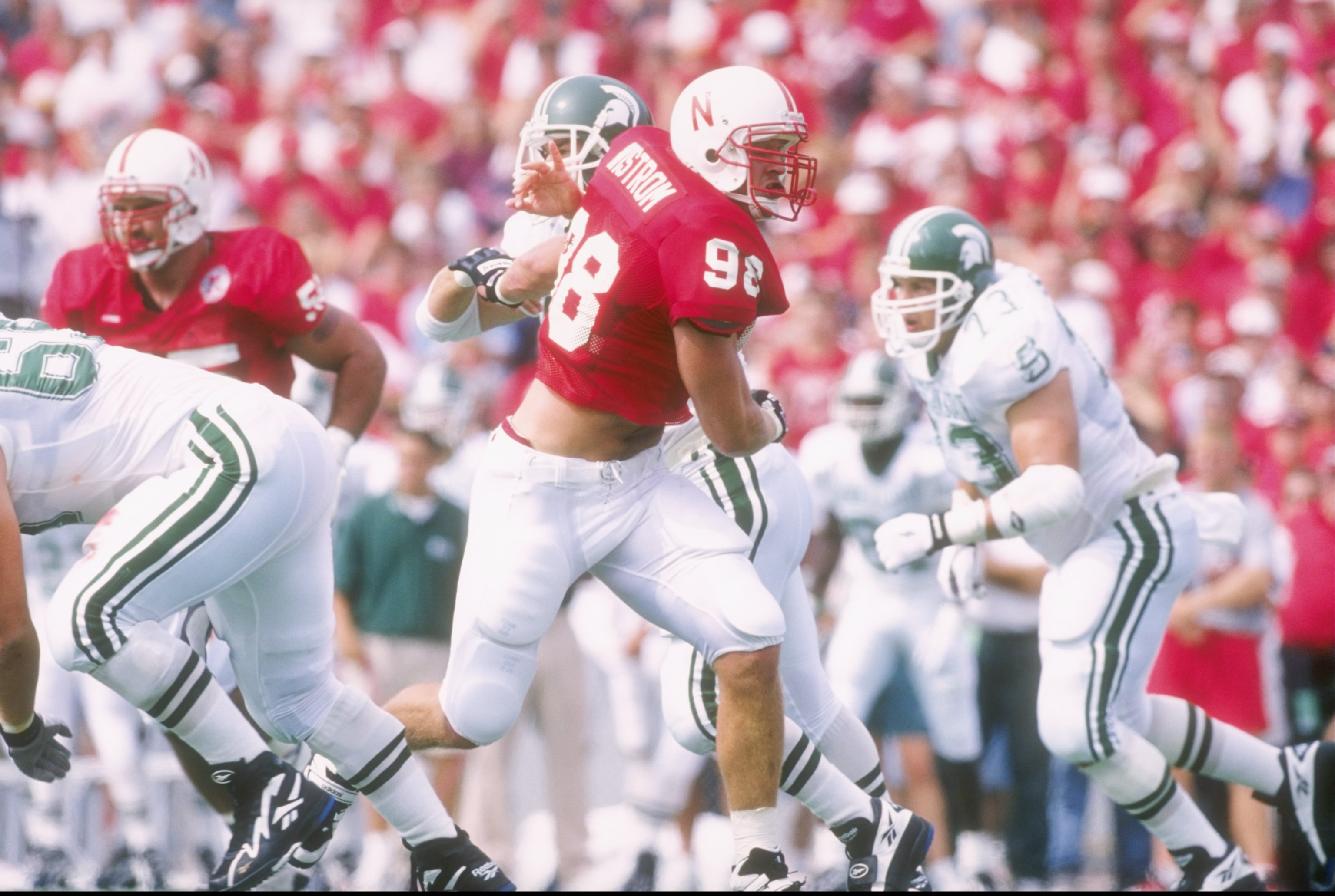 7 Sep 1996: Linebacker Grant Wistrom of the Nebraska Cornhuskers works against the Michigan State Spartans during a game at Memorial Stadium in Lincoln, Nebraska. Nebraska won the game, 55-14.