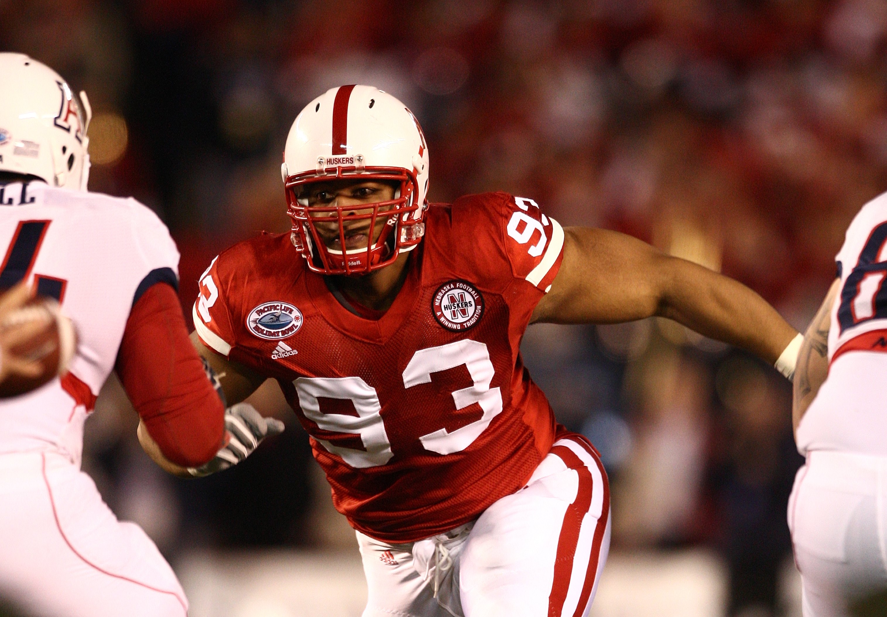 SAN DIEGO - DECEMBER 30: Ndamukong Suh #93 of the University of Nebraska Cornhuskers rushes to the line of scrimmage during the Pacific Life Holiday Bowl against University of Arizona Wildcats on December 30, 2009 at Qualcomm Stadium in San Diego, Califo