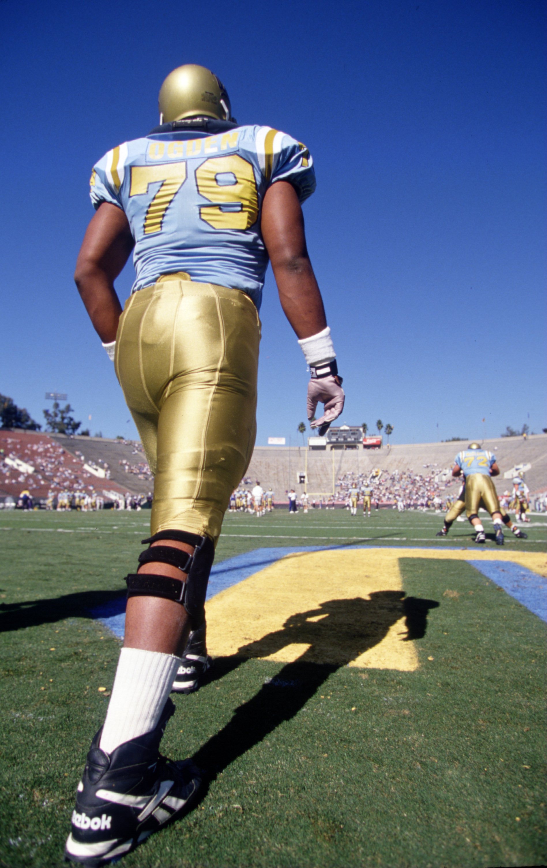 11 Nov 1995: Offensive lineman Jonathan Ogden #79 of the UCLA Bruins stretches in the endzone during pre-game warm-ups before the Bruins 38-14 loss to the Washington Huskies at the Rose Bowl in Pasadena, California. Mandatory Credit: Al Bello/ALLSPORT
