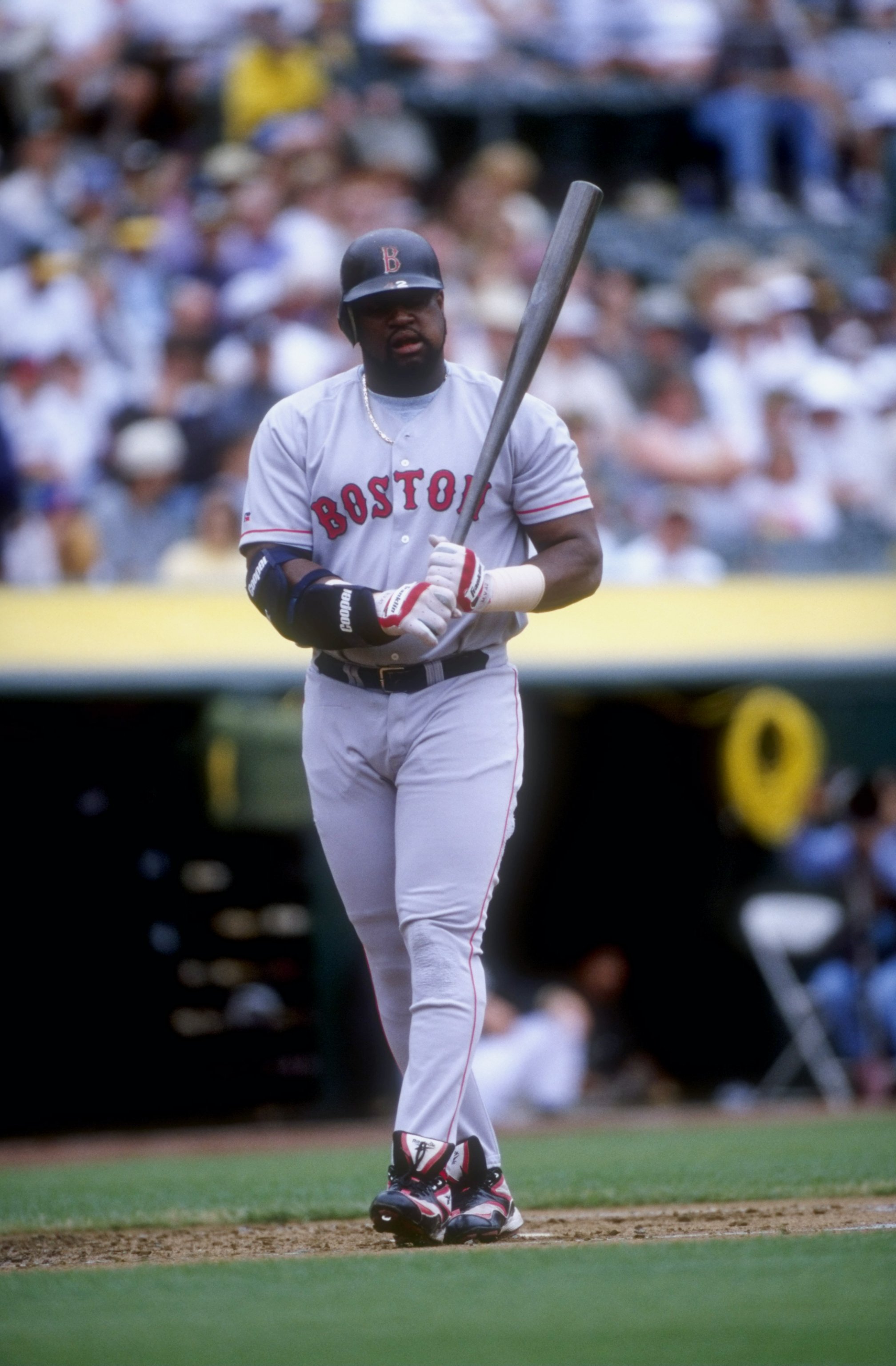 30 Jul 1998:  Infielder Mo Vaughn #42 of the Boston Red Sox in action during a game against the Oakland Athletics at the Oakland Coliseum in Oakland, California. The Athletics defeated the Red Sox 6-5. Mandatory Credit: Otto Greule Jr.  /Allsport