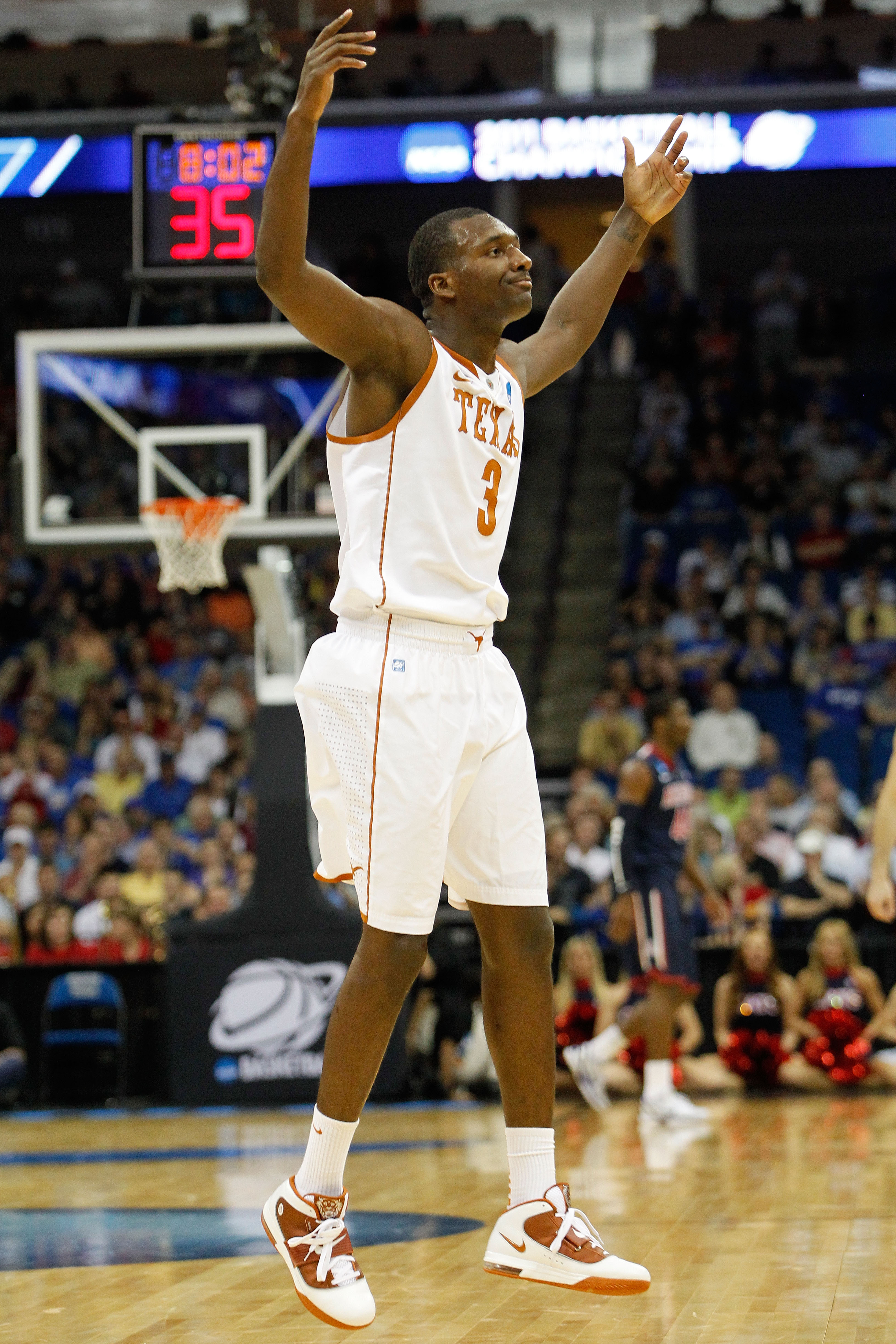 TULSA, OK - MARCH 20:  Jordan Hamilton #3 of the Texas Longhorns celebrates after a play against the Arizona Wildcats during the third round of the 2011 NCAA men's basketball tournament at BOK Center on March 20, 2011 in Tulsa, Oklahoma.  (Photo by Tom Pe
