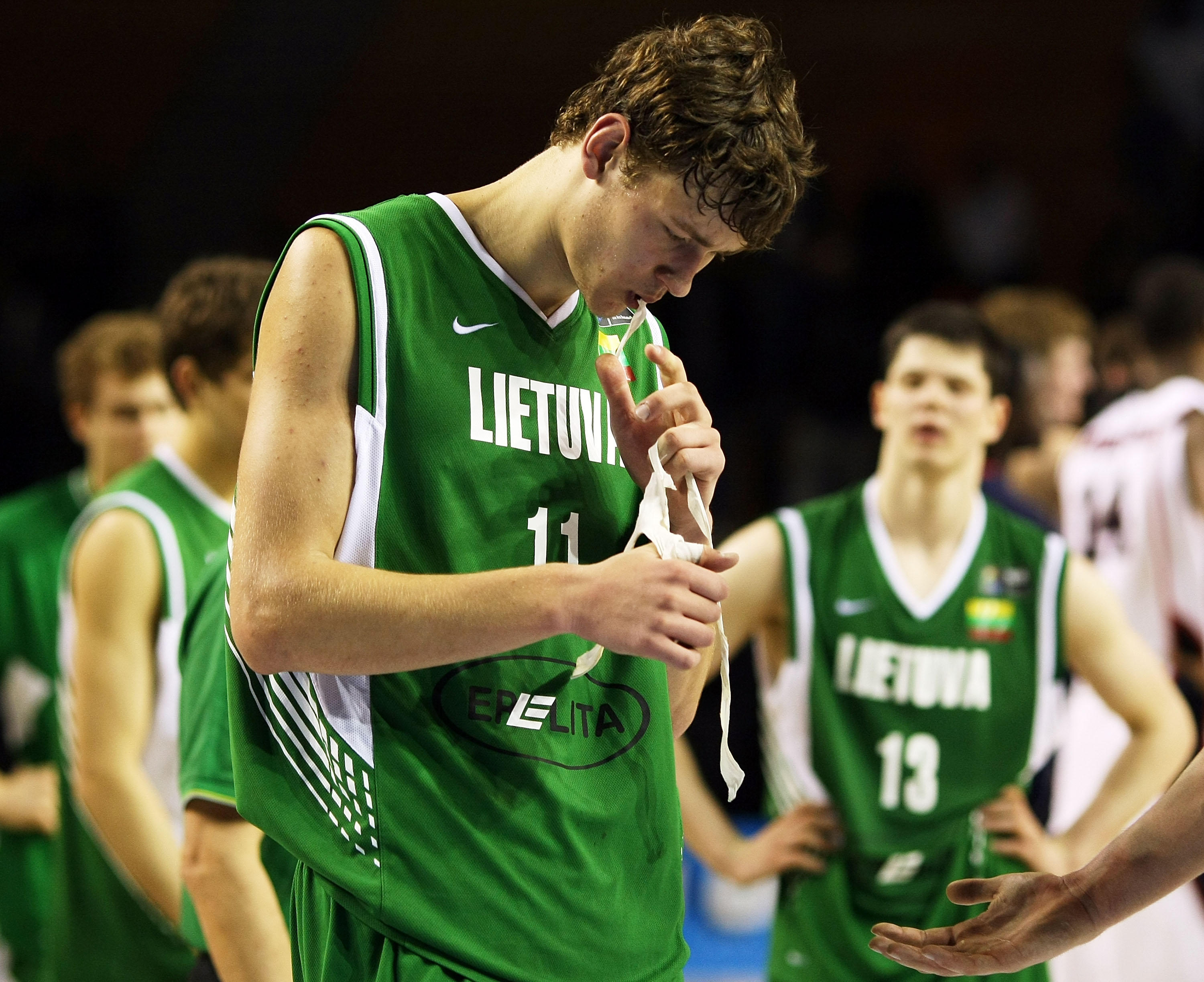 AUCKLAND, NEW ZEALAND - JULY 08:  Donatas Motiejunas of Lithuania walks off after losing the U19 Basketball World Championships match between the United States and Lithuania at North Shore Events Centre on July 8, 2009 in Auckland, New Zealand.  (Photo by