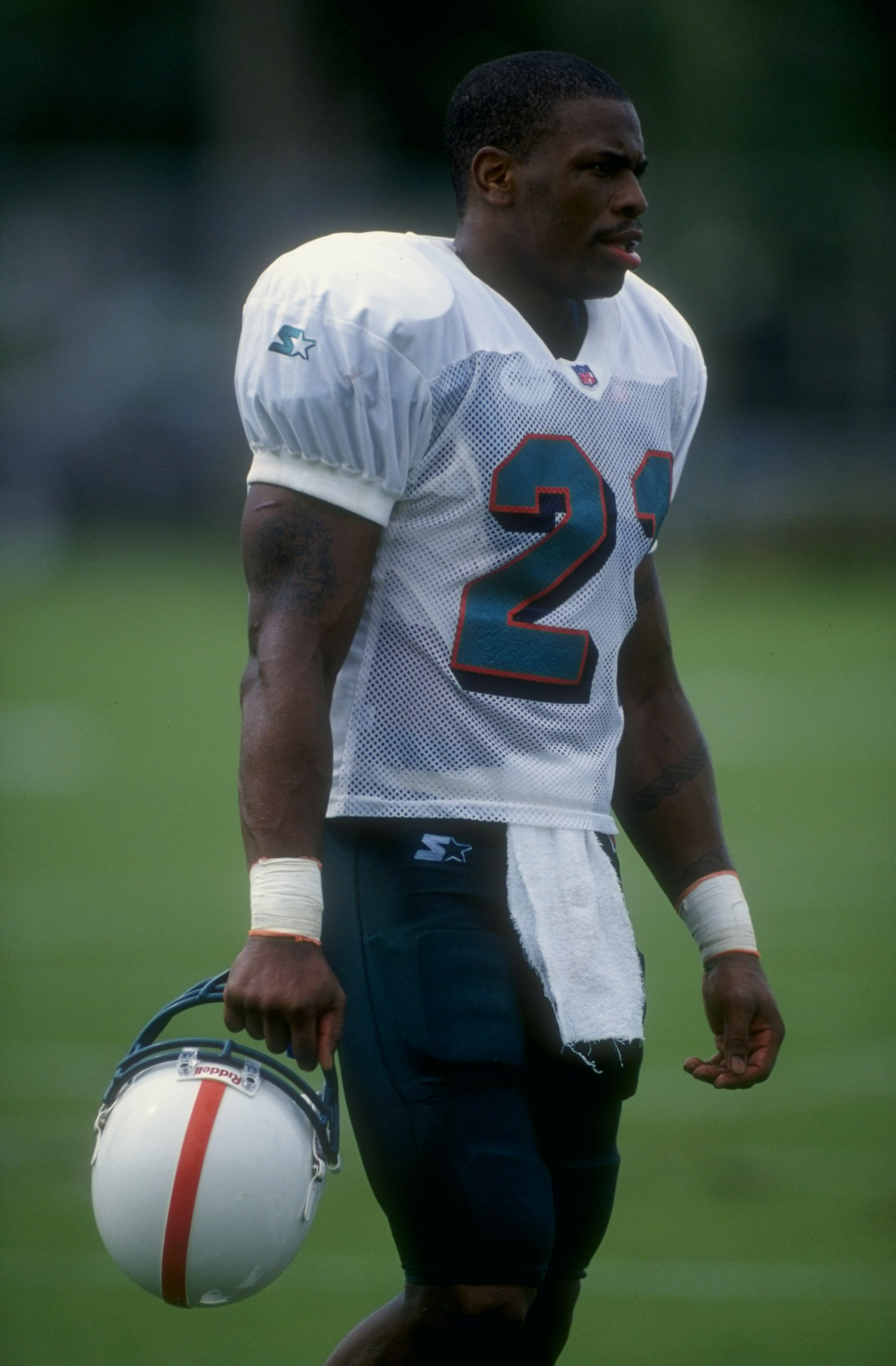 22 Jul 1998:  Running back Lawrence Phillips #21 of the Miami Dolphins looks on during Miami Dolphins training camp in Davie, Florida. Mandatory Credit: Eliot J. Schechter  /Allsport