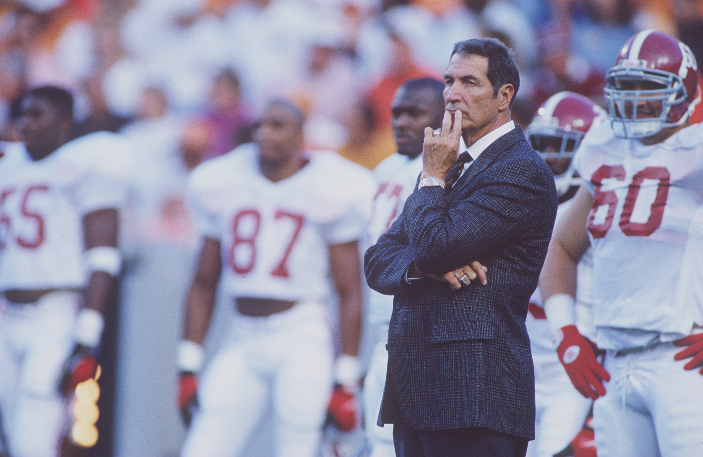 15 OCT 1994: ALABAMA HEAD COACH GENE STALLINGS STANDS ON THE FIELD WITH HIS TEAM BEFORE THE CRIMSON TIDE'S 17-13 VICTORY OVER THE TENNESSEE VOLUNTEERS AT NEYLAND STADIUM IN KNOXVILLE, TENNESSEE Mandatory Credit: Rick Stewart/ALLSPORT