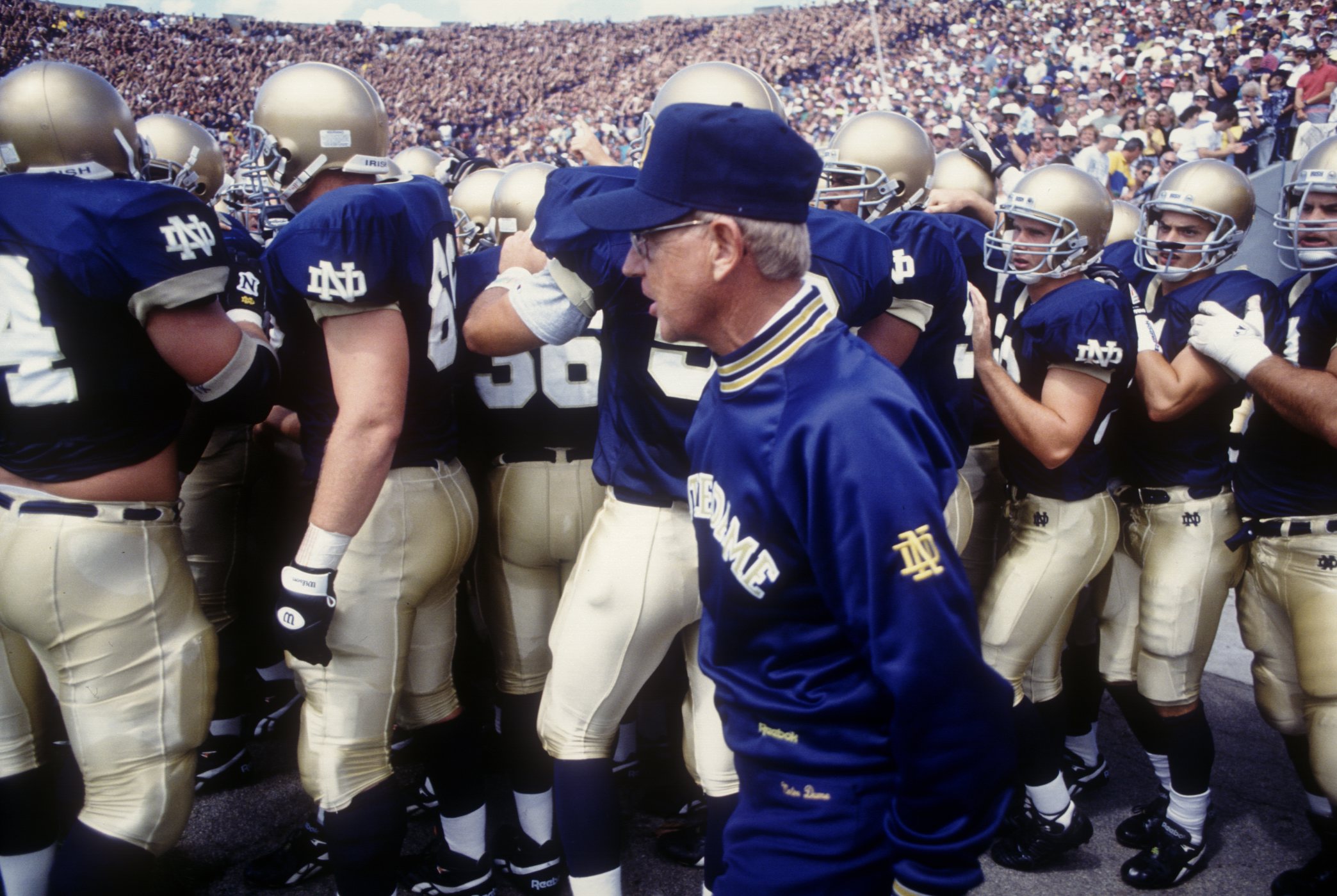 4 SEP 1993: NOTRE DAME''S HEAD COACH LOU HOLTZ WITH HIS TEAM IN THE BACKGROUND. Mandatory Credit: Jonathan Daniel/ALLSPORT